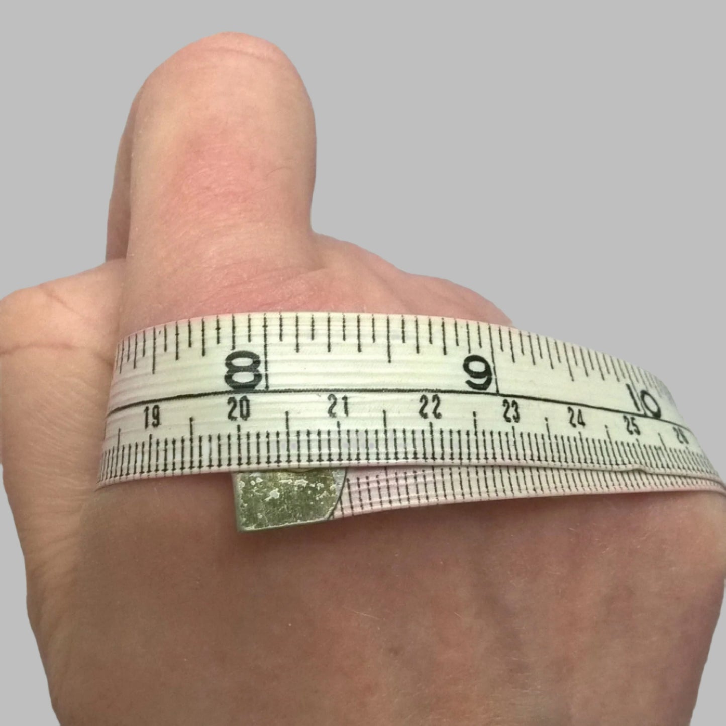 Measure around knuckles for size