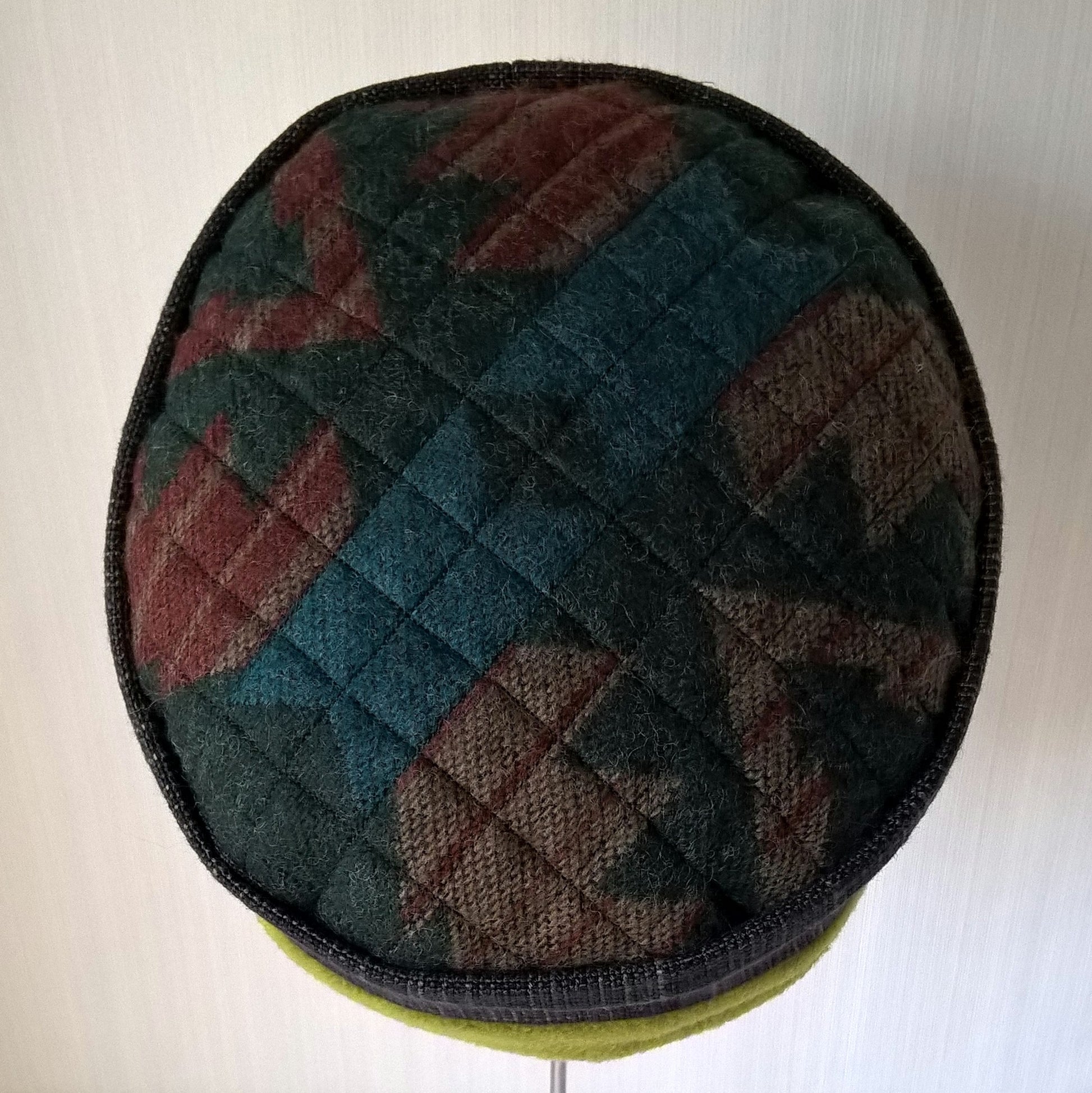 Aztec pattern on tip of quilted fleece hat
