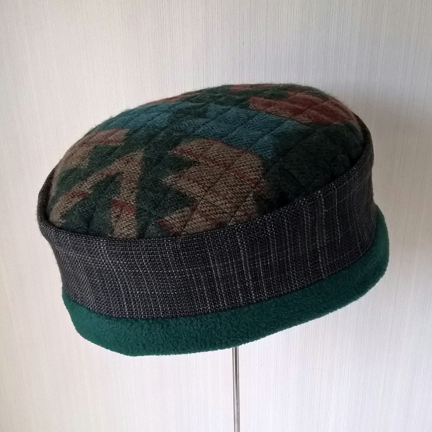 Forest green Aztec patterned winter hat with fleece lining