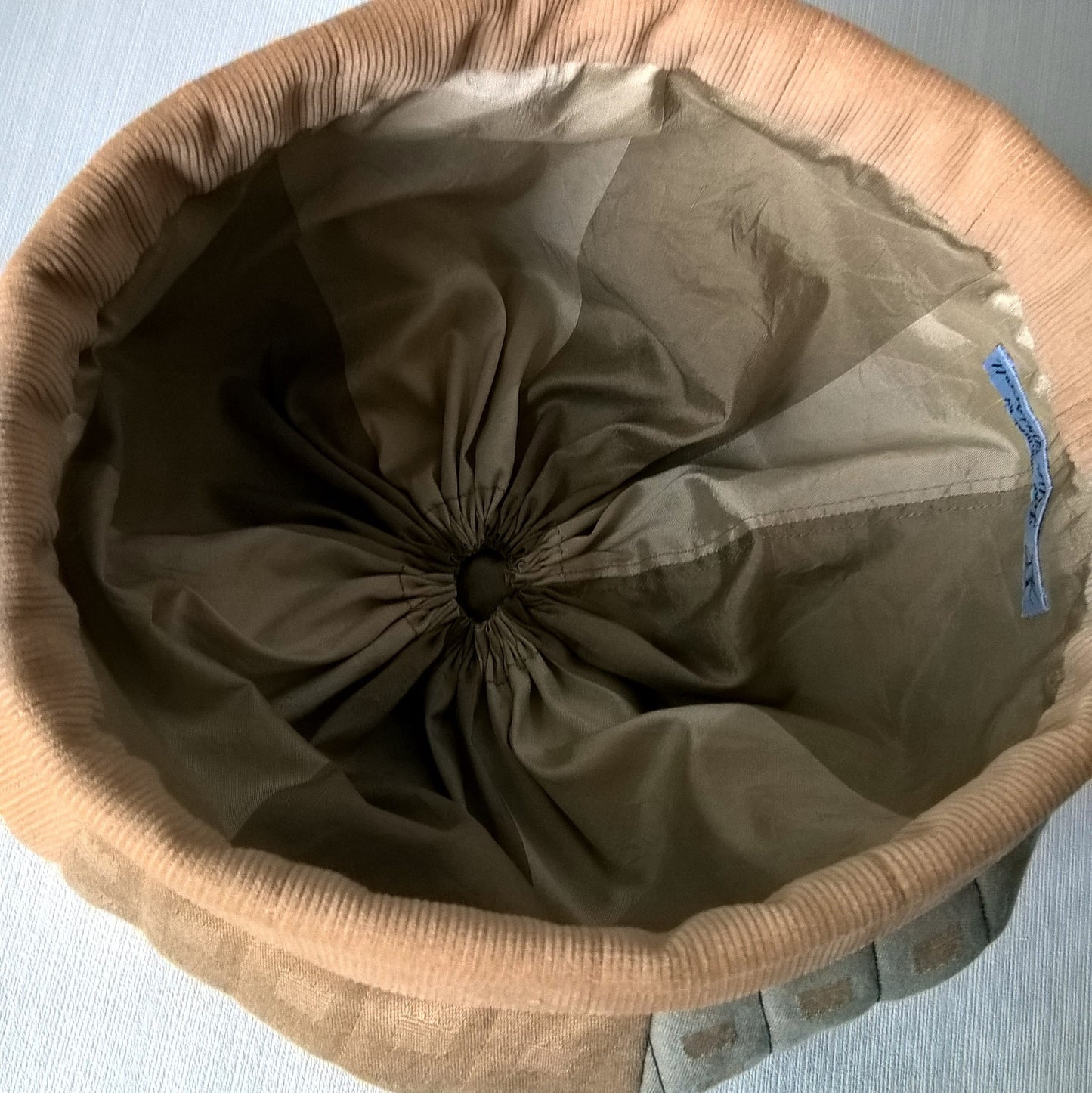 The hat is lined with silk.