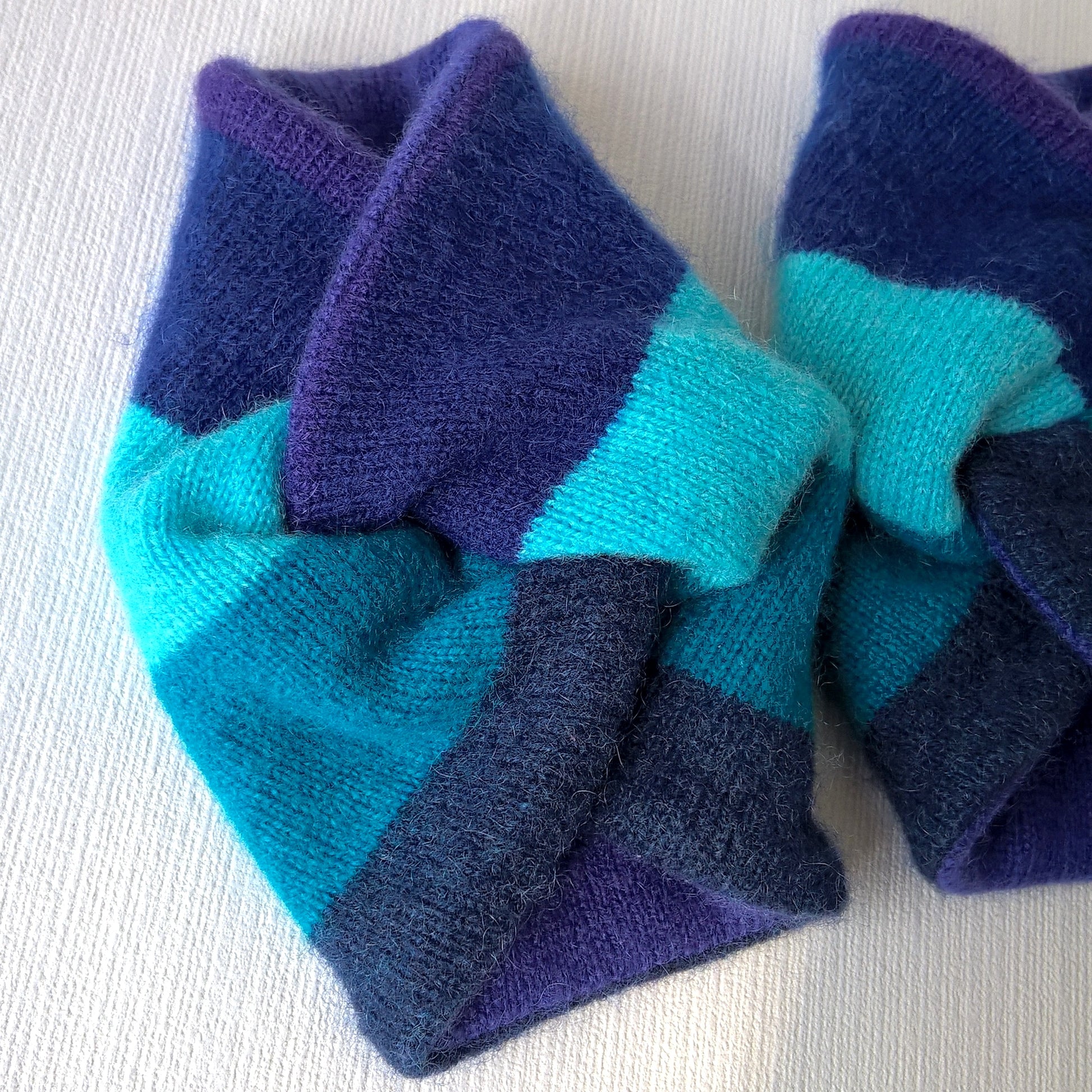 Green and navy stripe cashmere wrist cuffs lined with purple cashmere