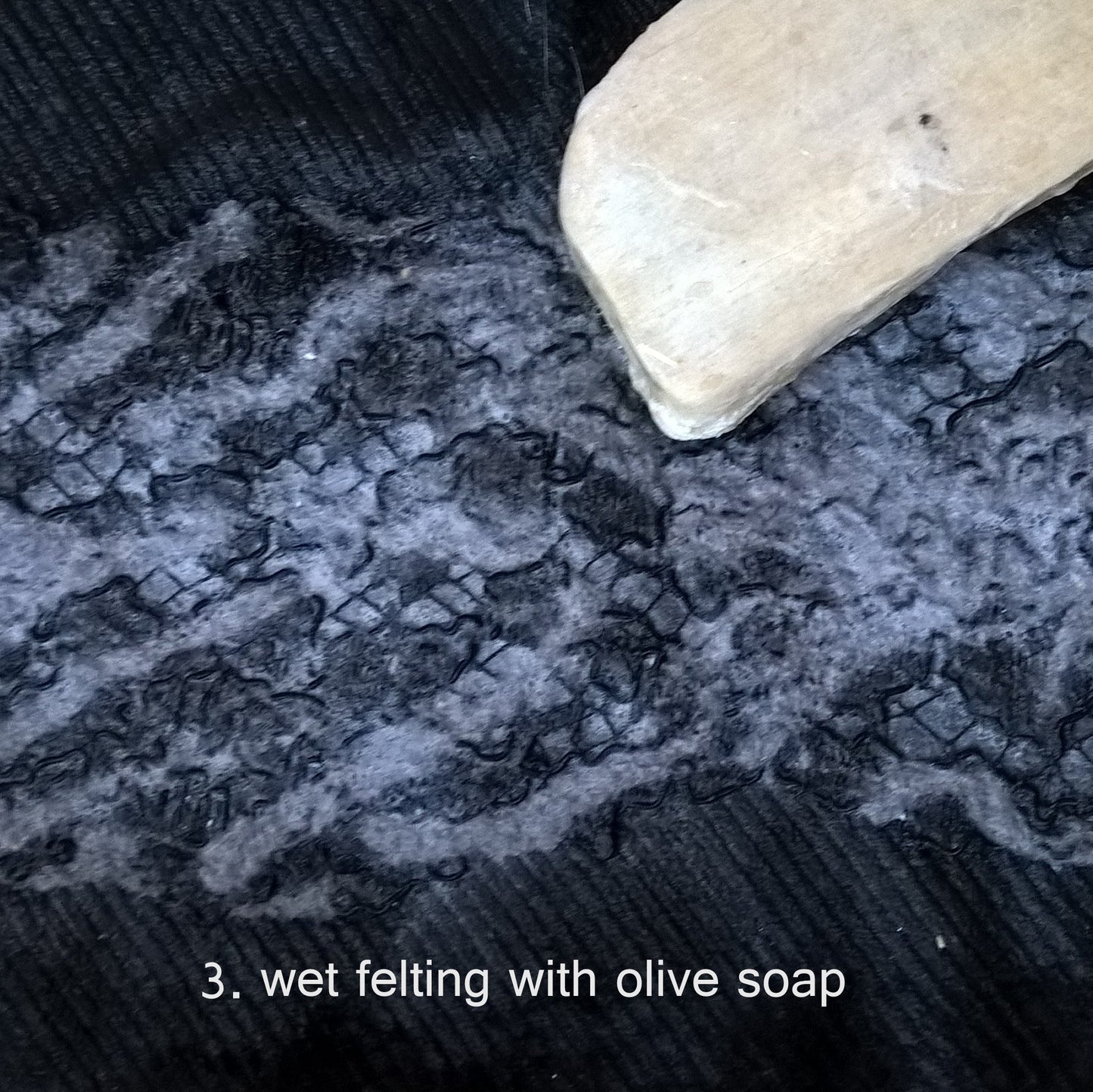 The creative process - wet felting the needle felted fabrics with olive soap