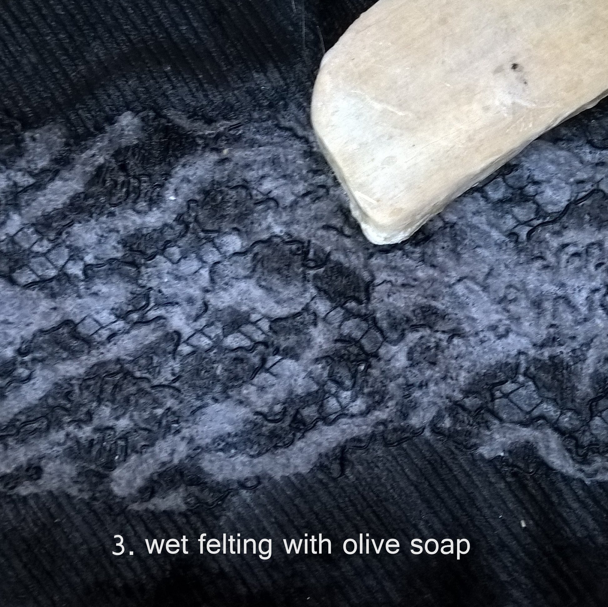 The creative process - wet felting the needle felted fabrics with olive soap