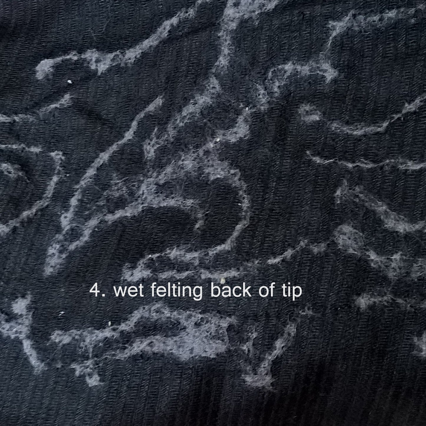 The creative process - wet felting the back of the fabrics for smoking cap tip