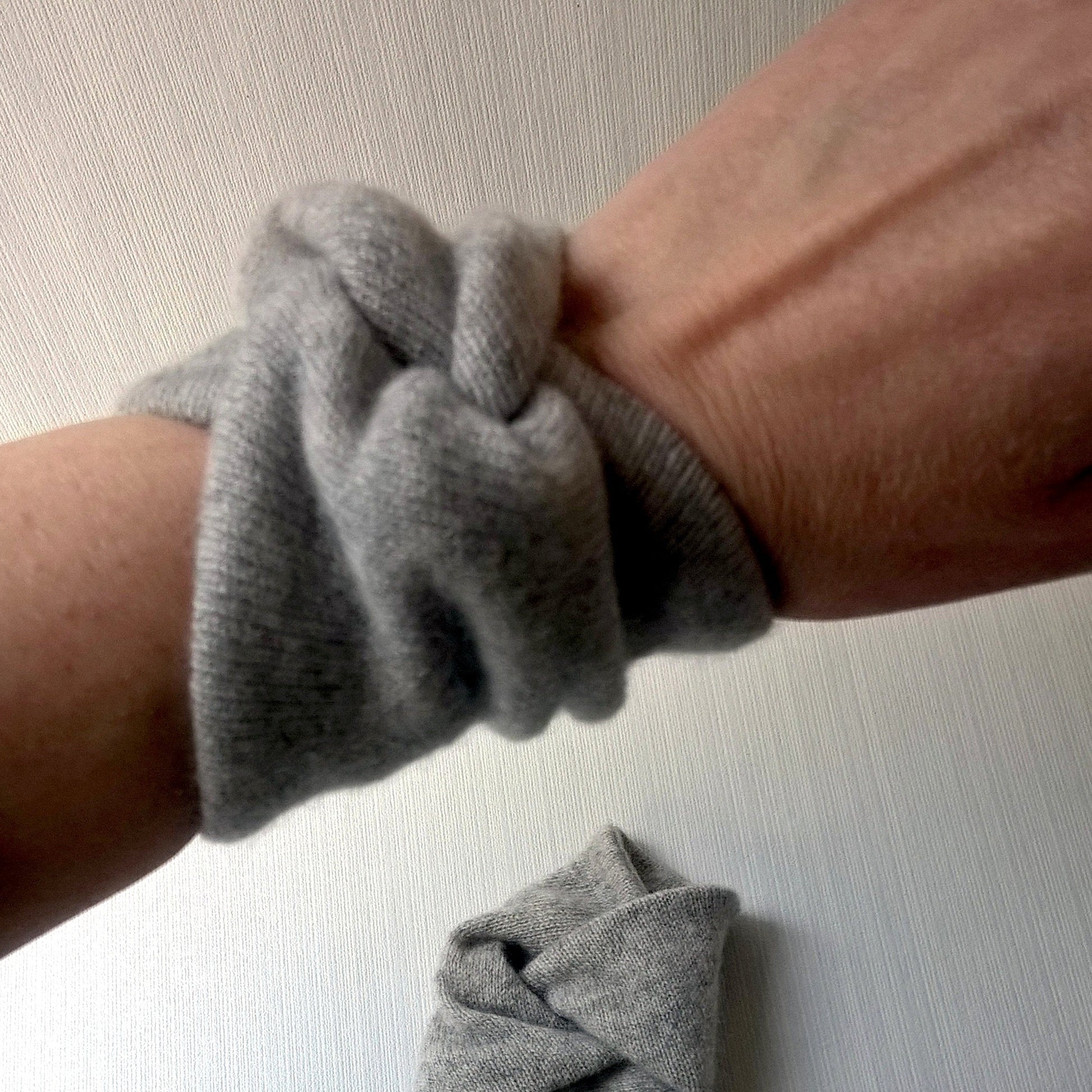 Keeping the pulse point on the wrists warm raises overall body temperature.