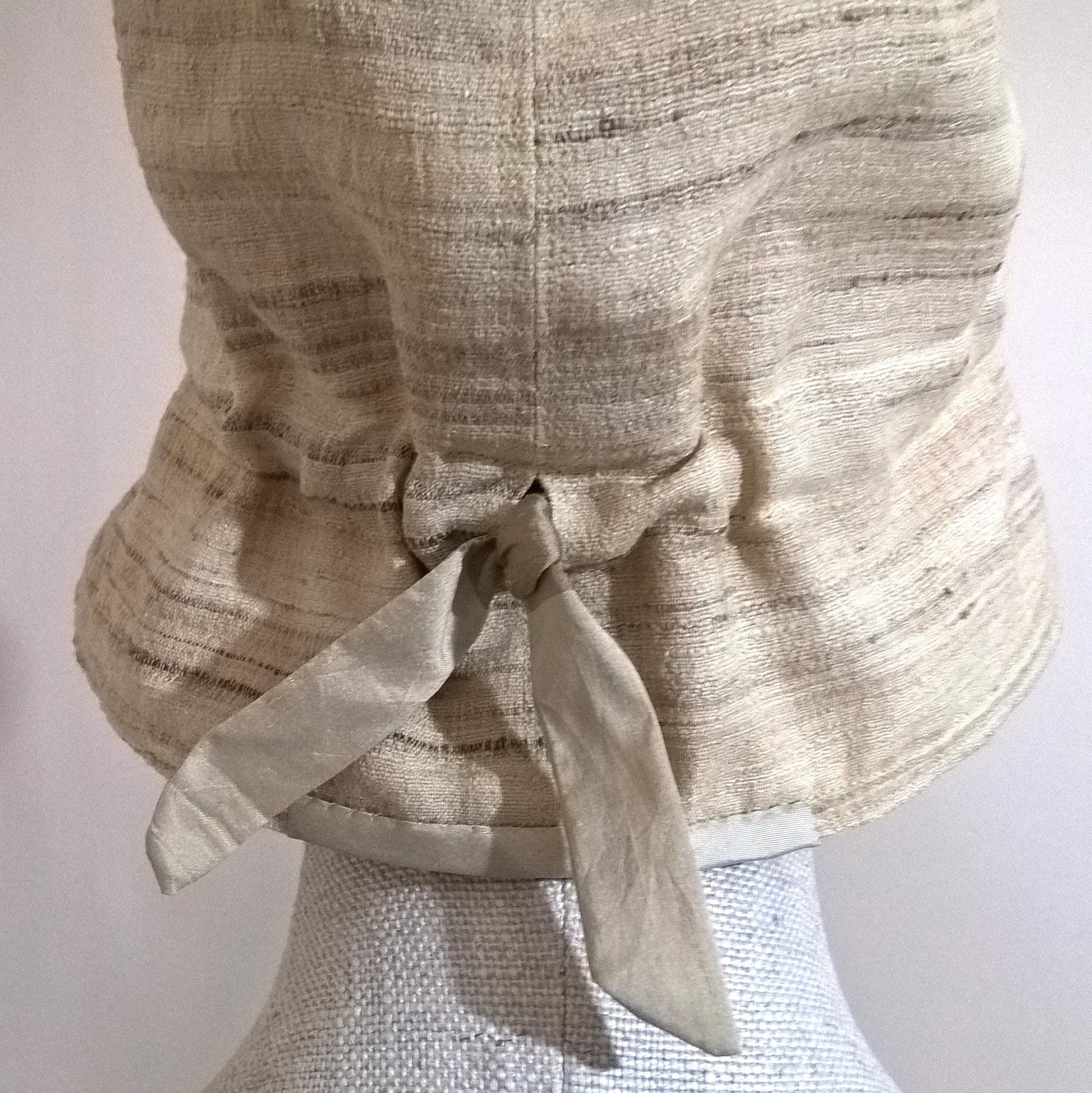 Adjustable tie ribbon at back of silk bucket hat