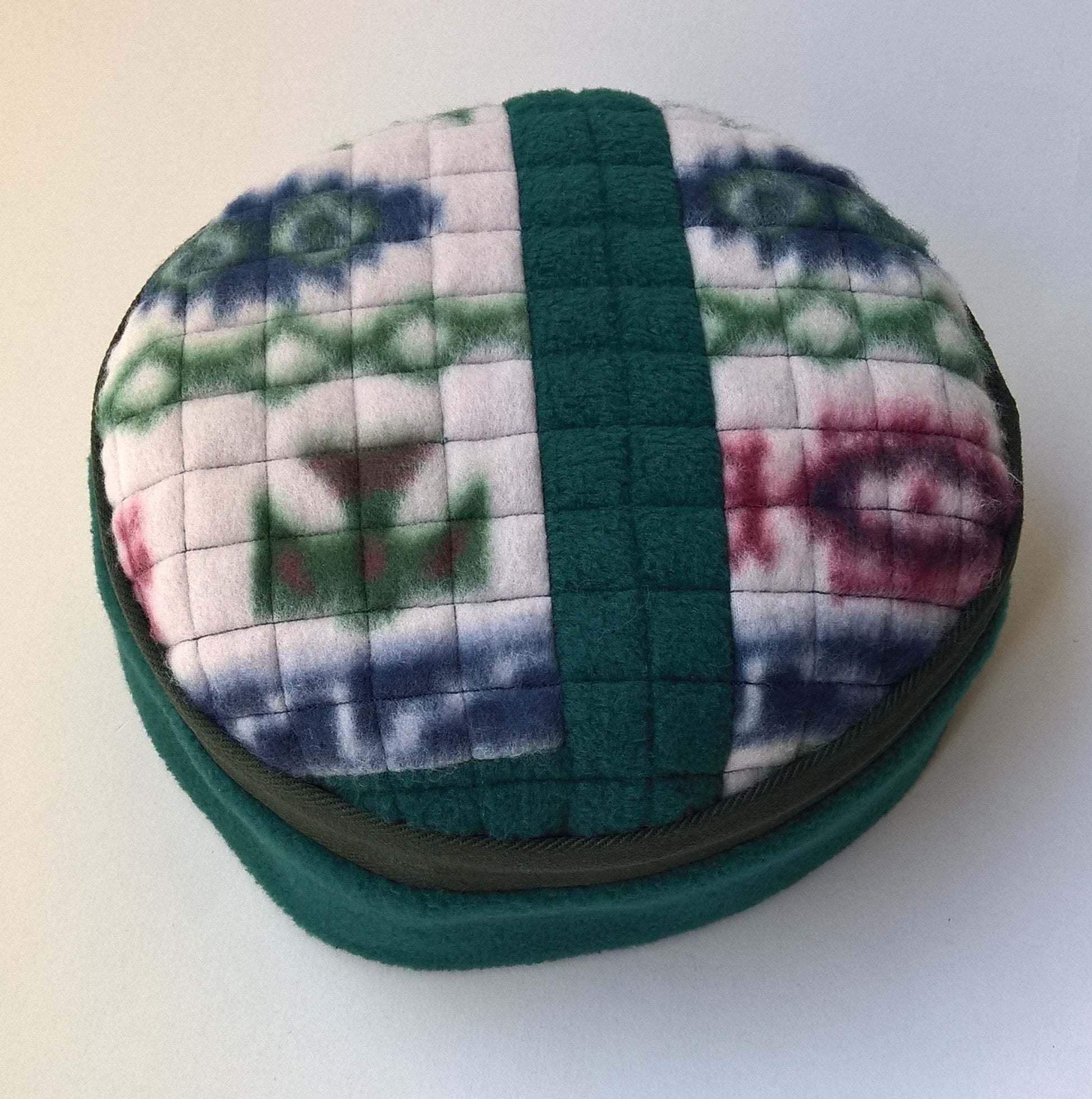 Aztec patterned fleece patchwork tip of pillbox hat