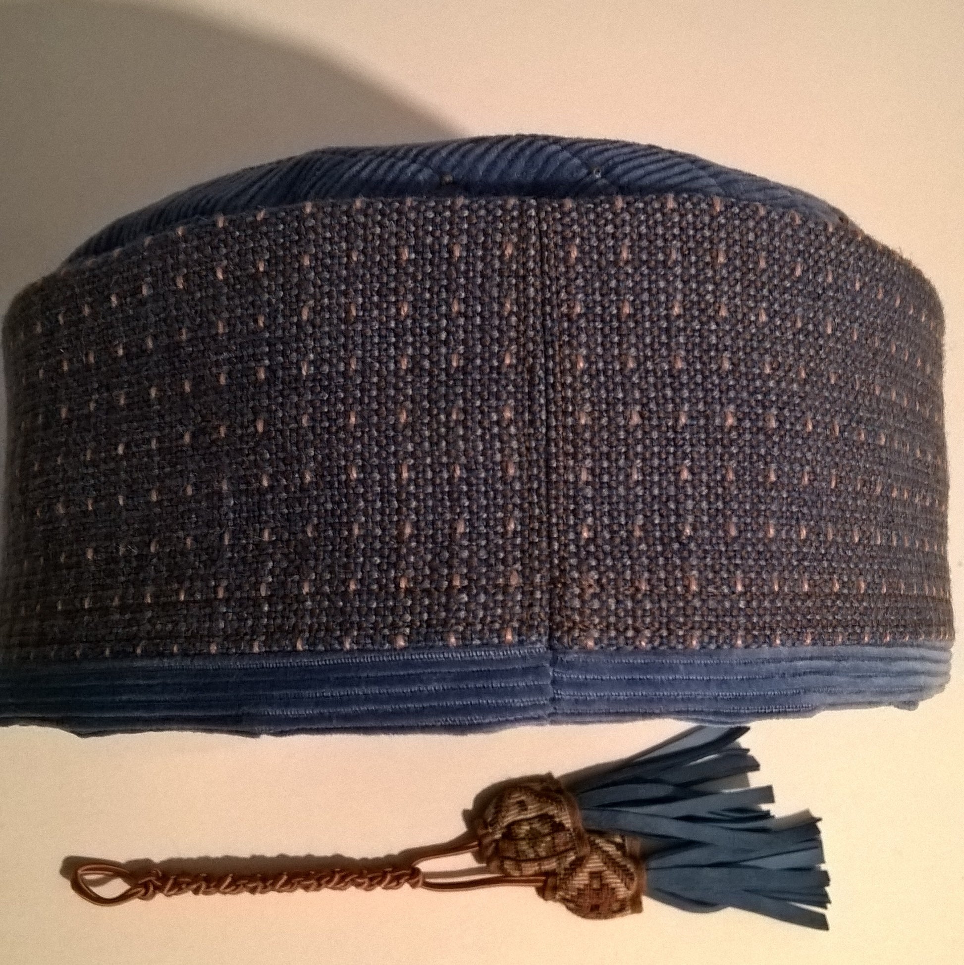 Back view of smoking cap