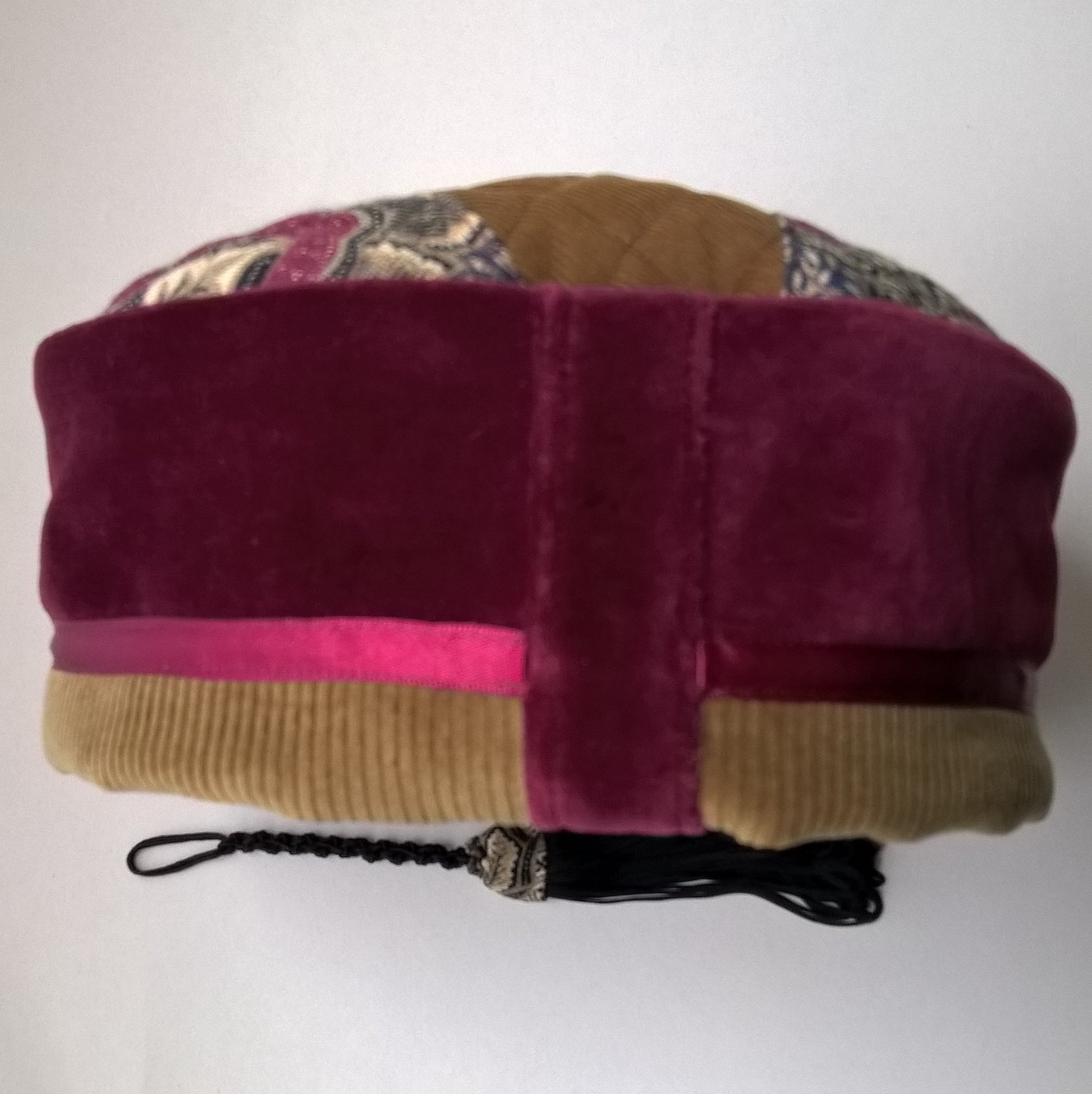 Back view of burgundy velvet smoking cap