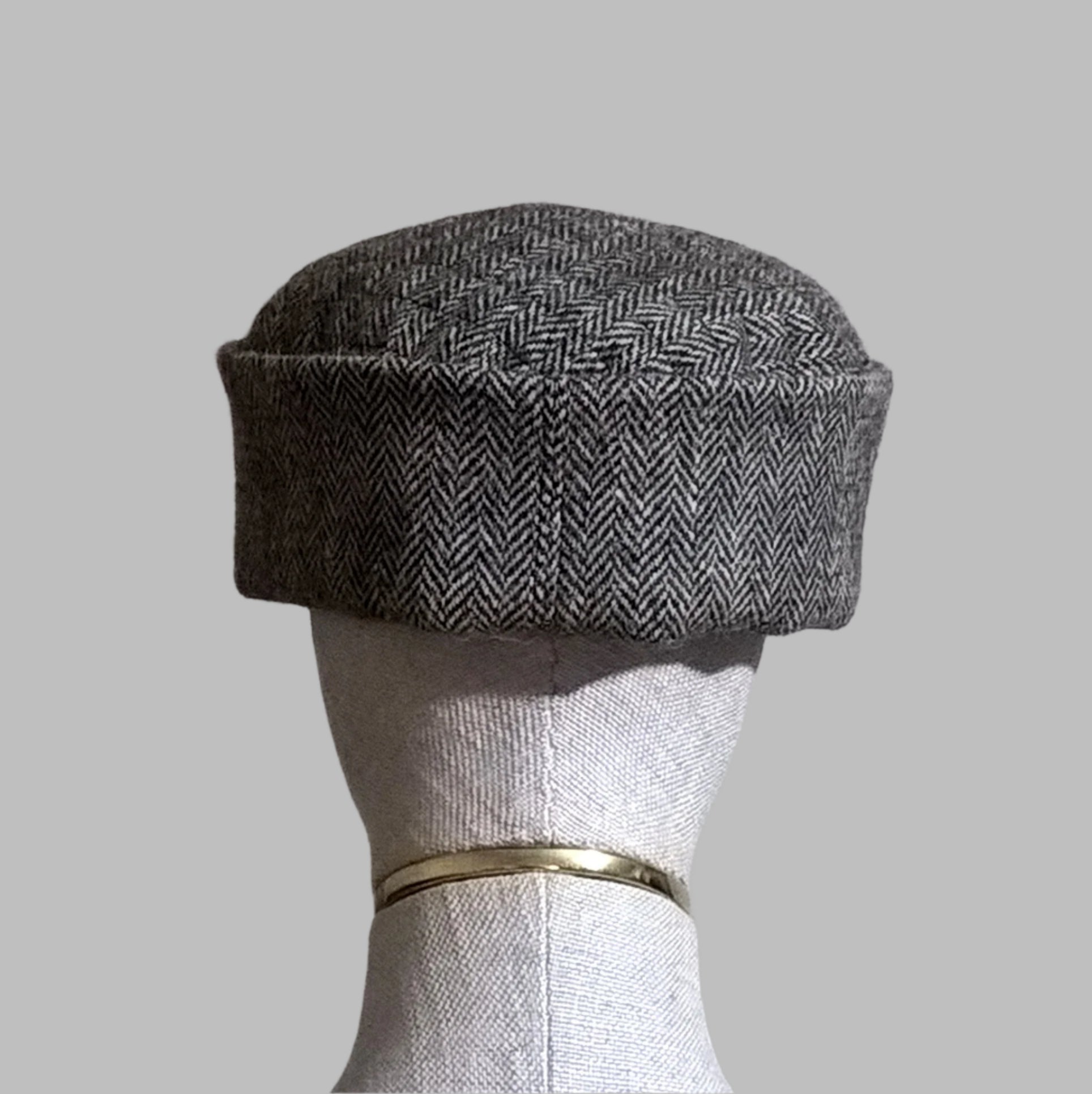 Back view of Harris Tweed brown herringbone brimless hat