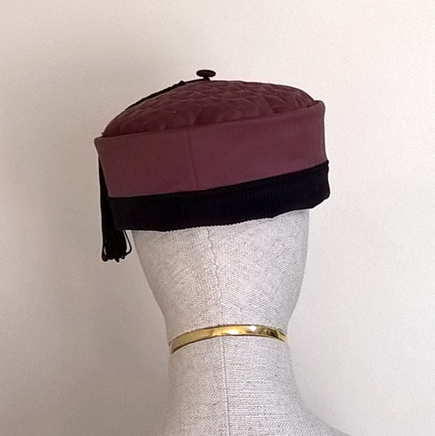 Back view of the maroon smoking cap