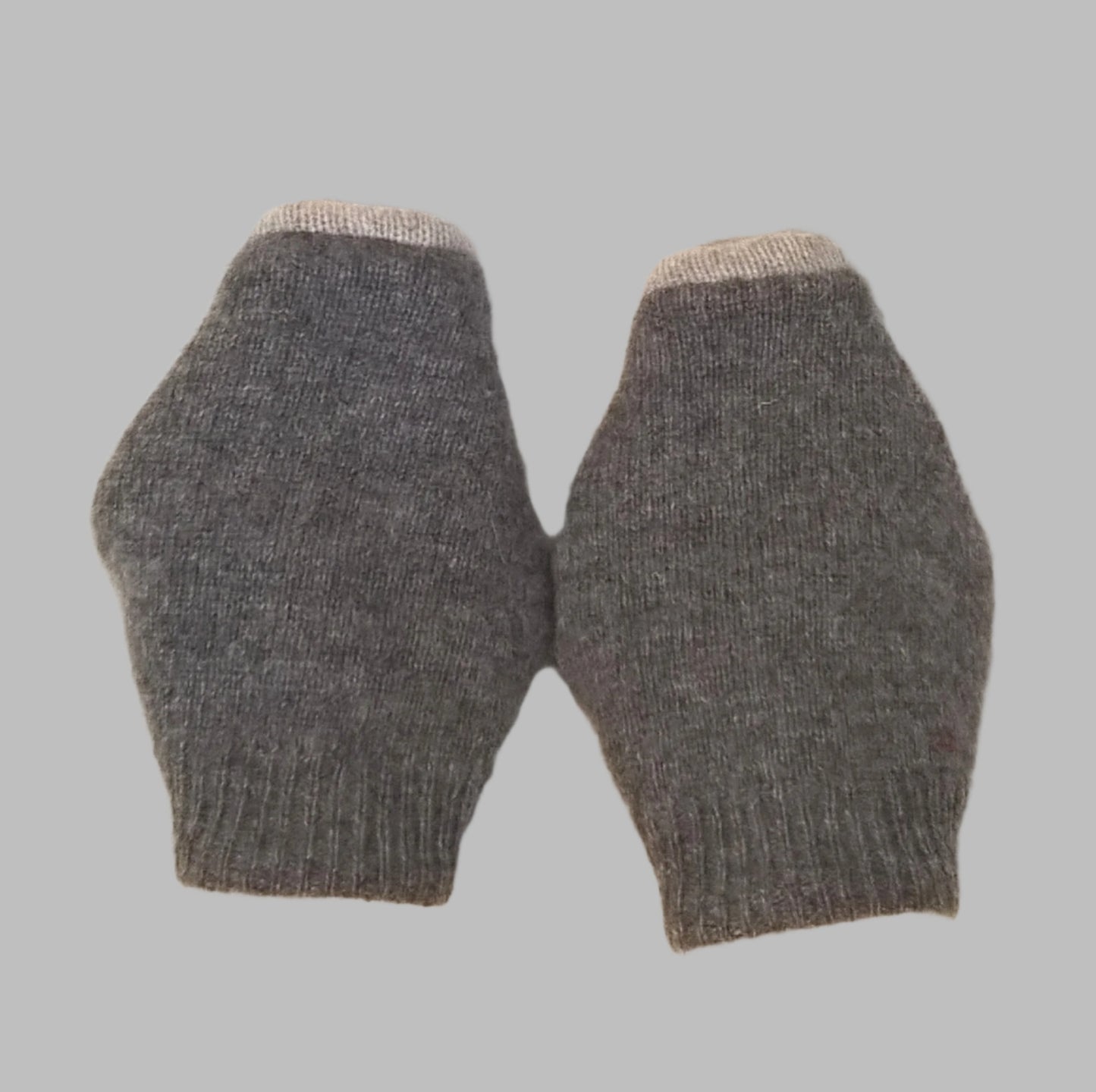 Back view of the two tone grey pure cashmere wrist warmer cuffs, handmade from up-cycled sweaters with rib detail