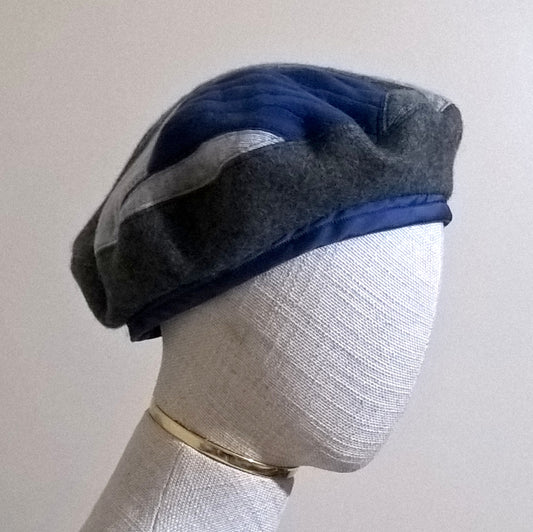 Blue and grey beret handmade with up-cycled cashmere sweaters and pure wool felt in a patchwork design