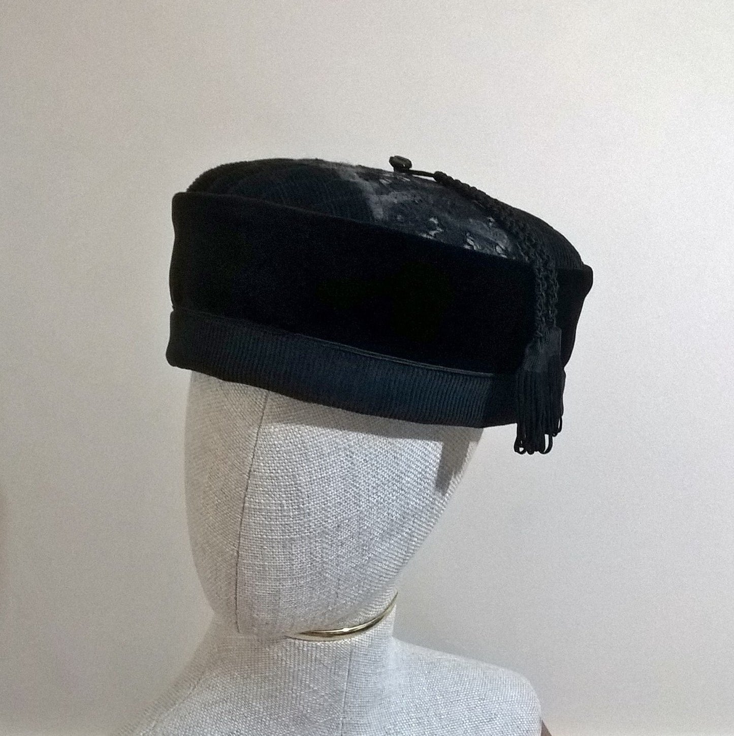 Gothic black velvet and cord pillbox cap with nuno felting and macrame satin tassel