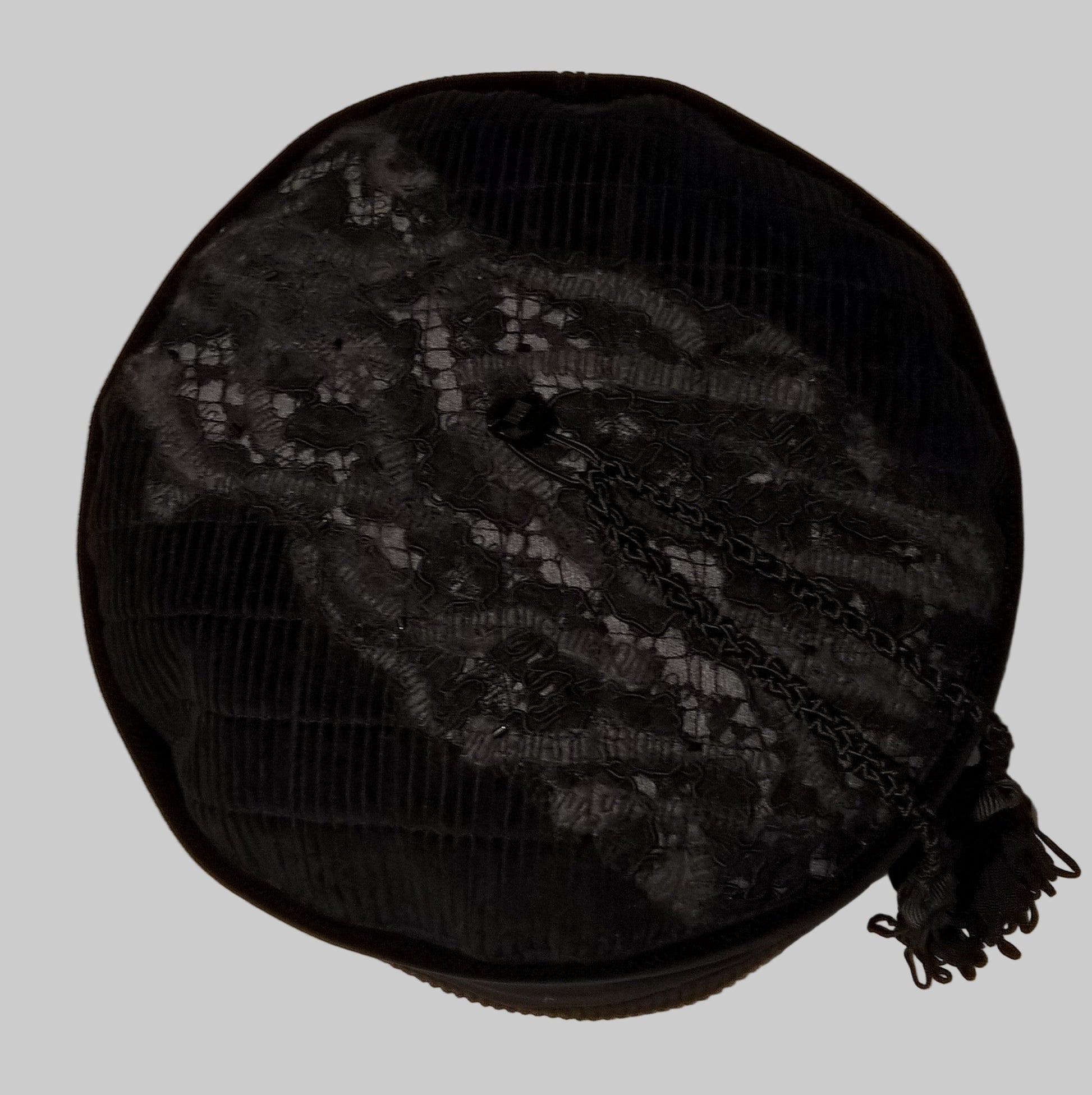 Black lace and grey wool needle felted on tip of smoking cap