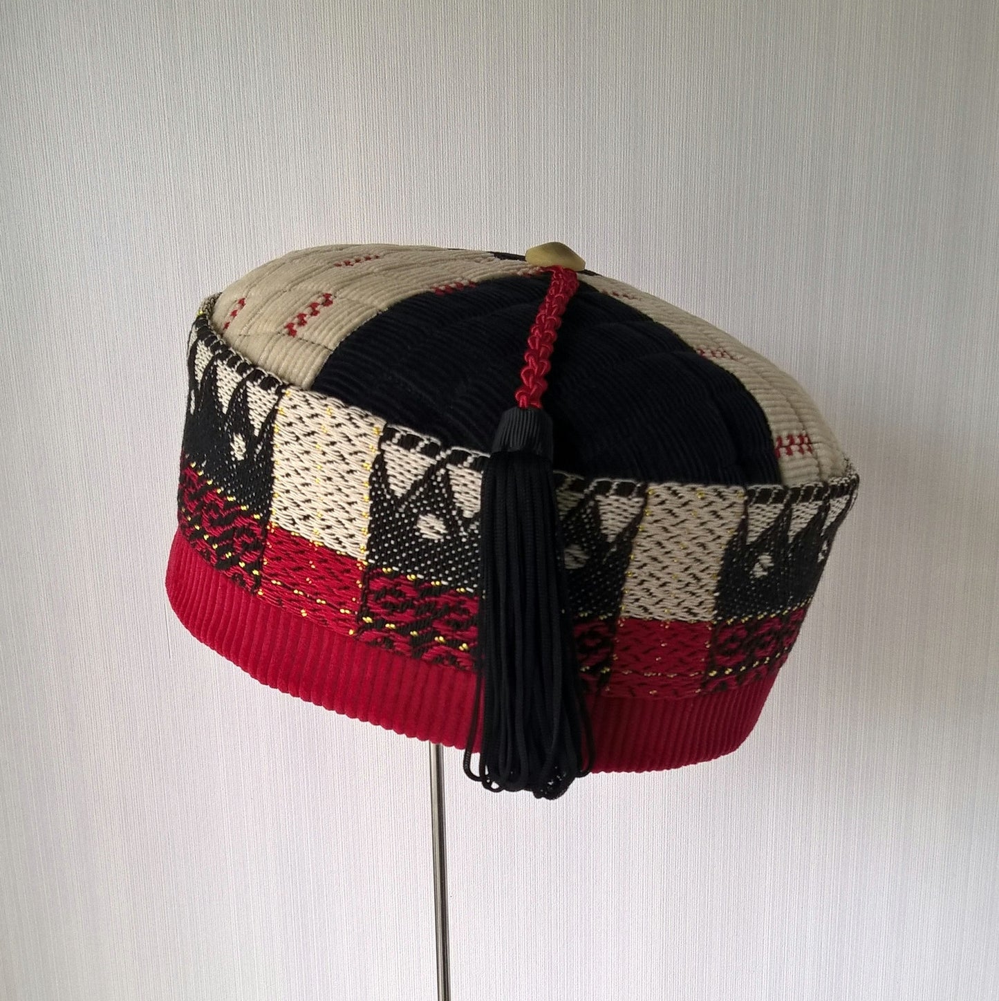 Ethnic smoking cap in black, red, and cream  with gold thread detail