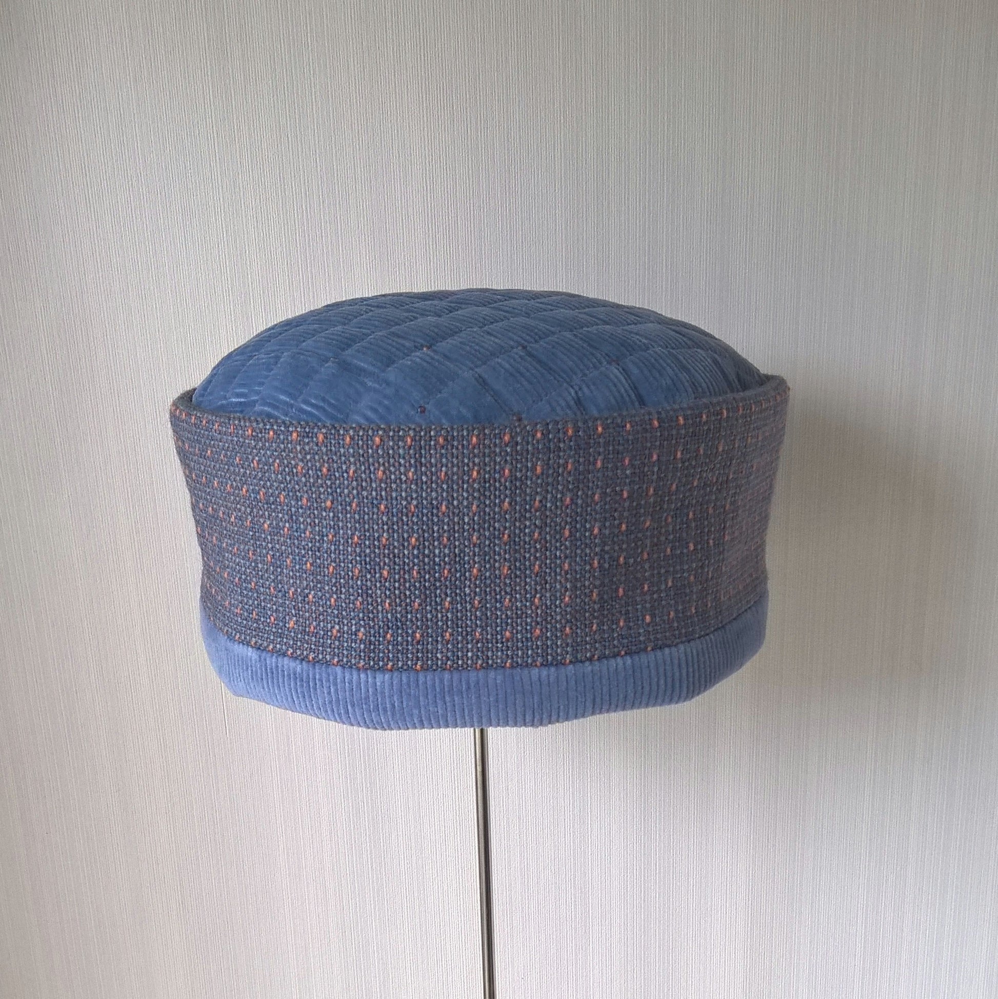 Blue corduroy brimless hat with quilted and  beaded tip