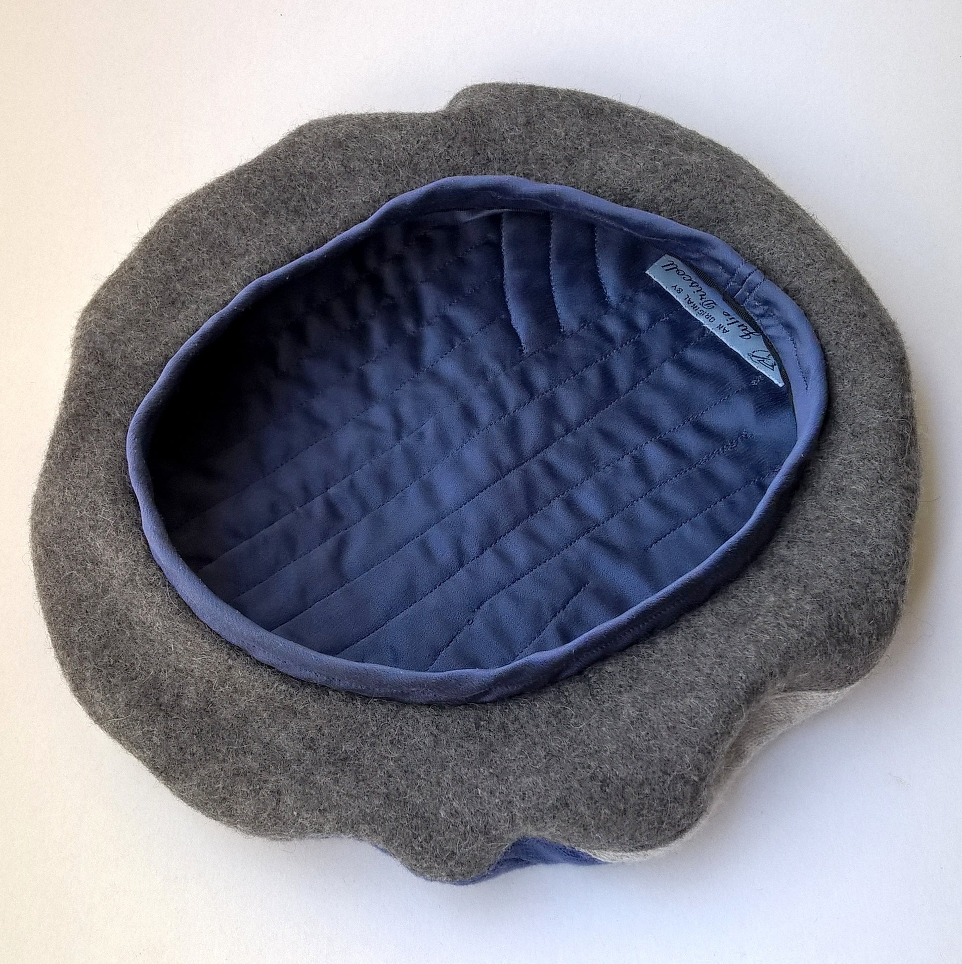 Pure wool underside of beret and quilted silk lining