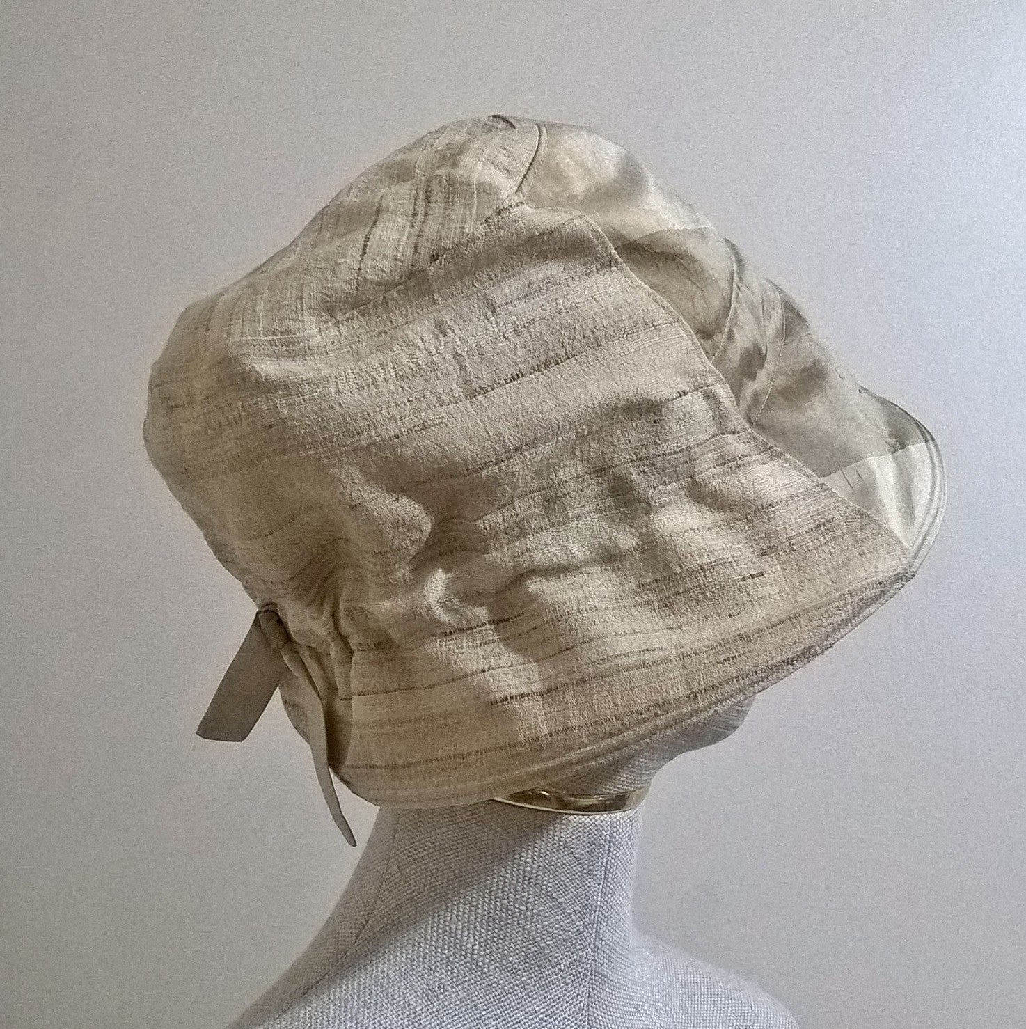 The bonnet style back of the bucket hat means there is room for a bun or ponytail 