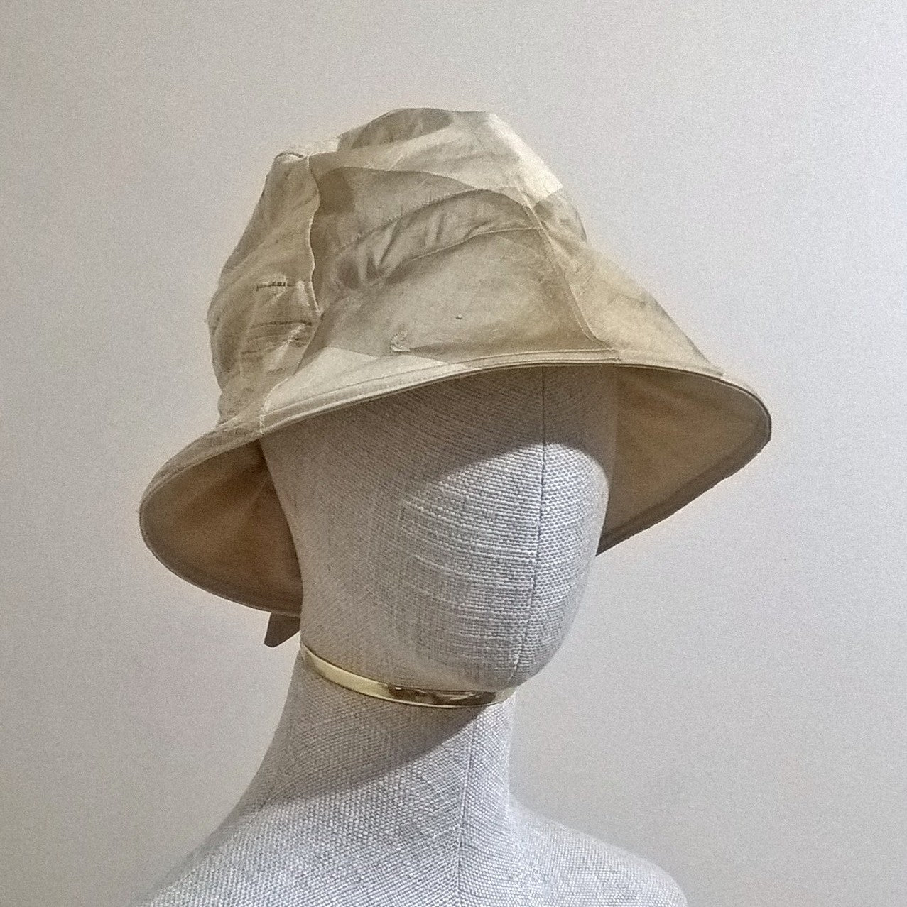 Silk bucket hat with size adjustable back bow detail