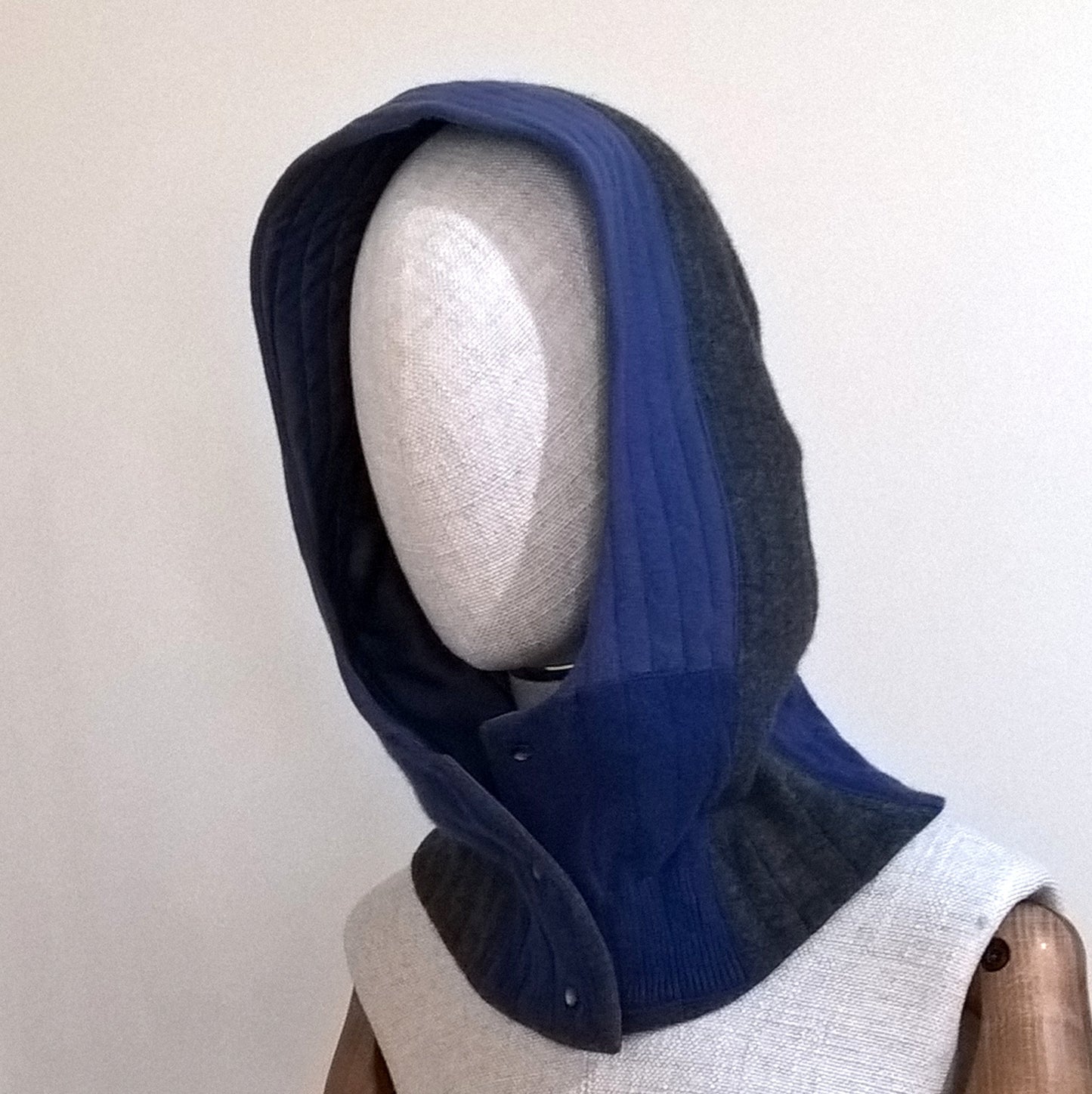 Button front neck warmer with attached hood