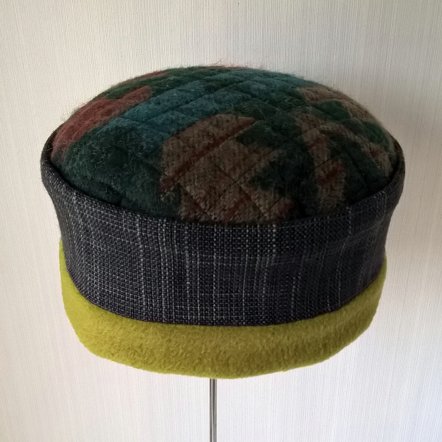 Brimless fleece hat with Aztec design on tip