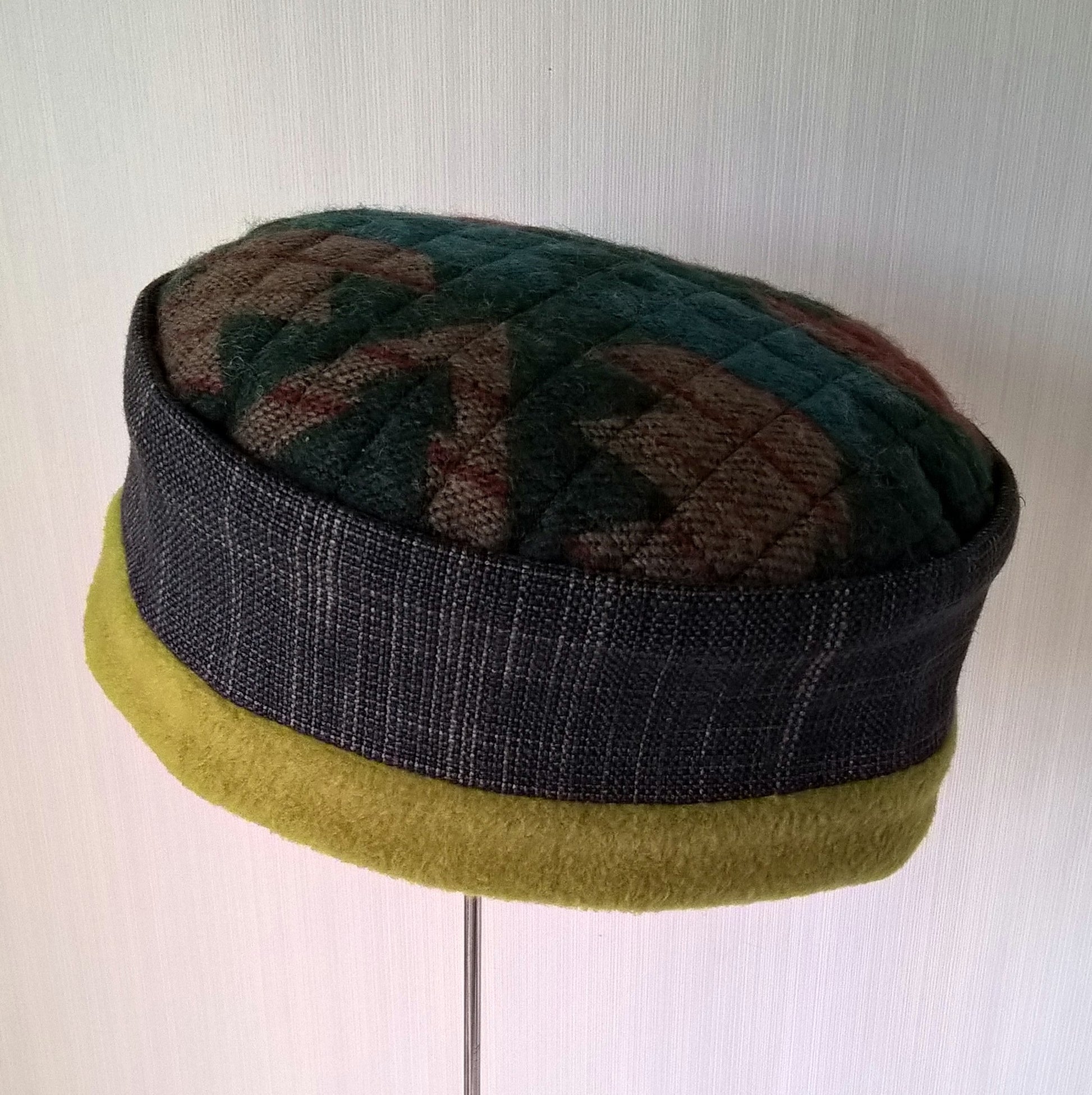 Chartreuse green pillbox style cap with Aztec patterned tip