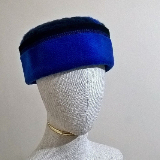 Cobalt blue and black brimless fleece hat with stitch detail