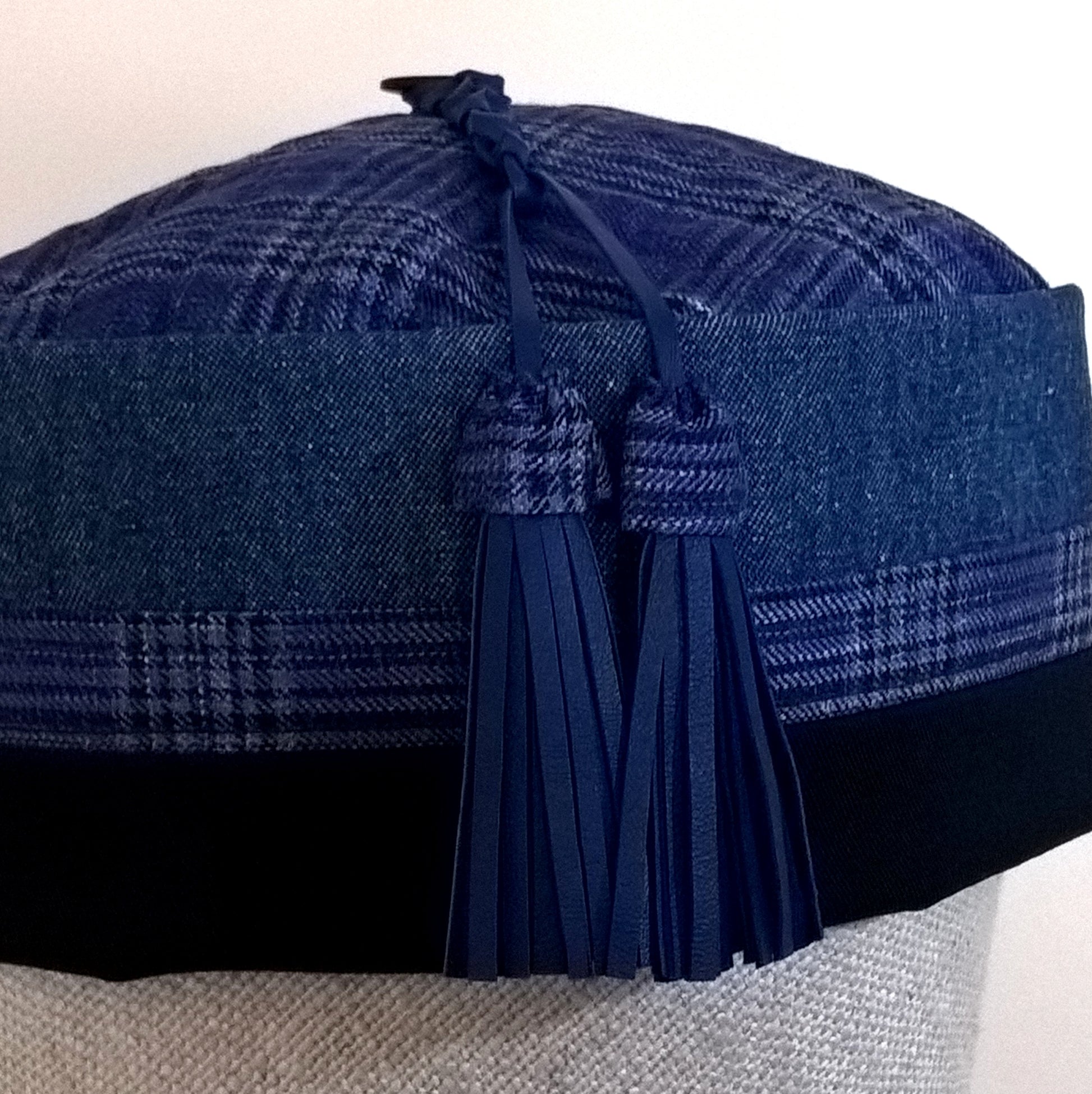 Cobalt blue macrame leather tassel trimmed with fine wool check fabric