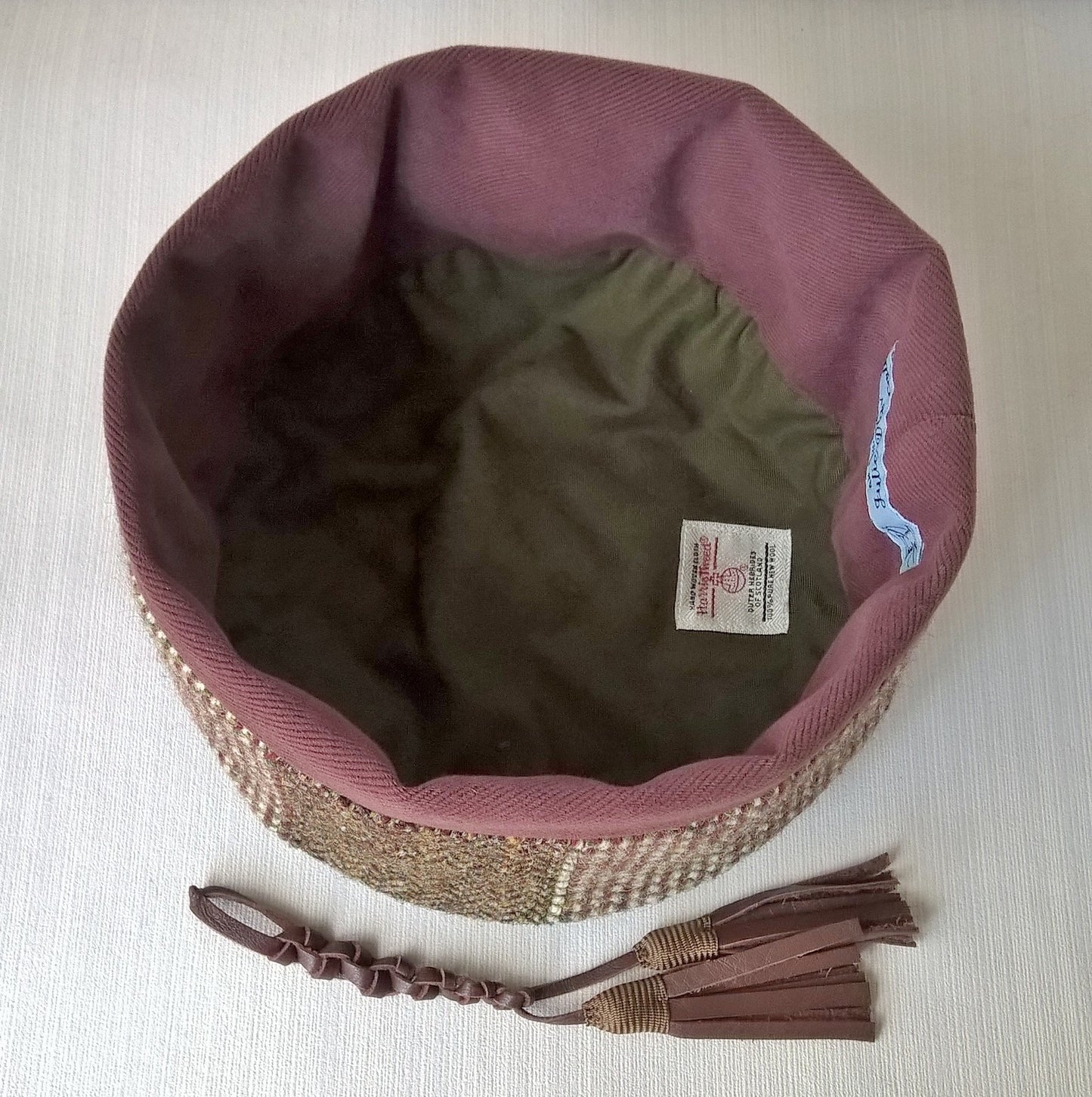 Cotton lining of Harris Tweed smoking cap with removable tassel