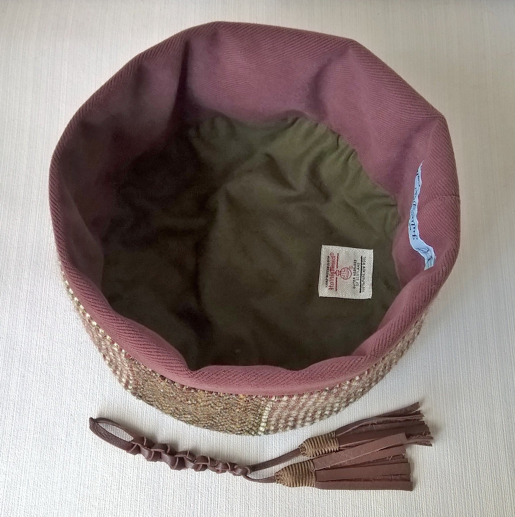 Cotton lining of Harris Tweed smoking cap with removable tassel