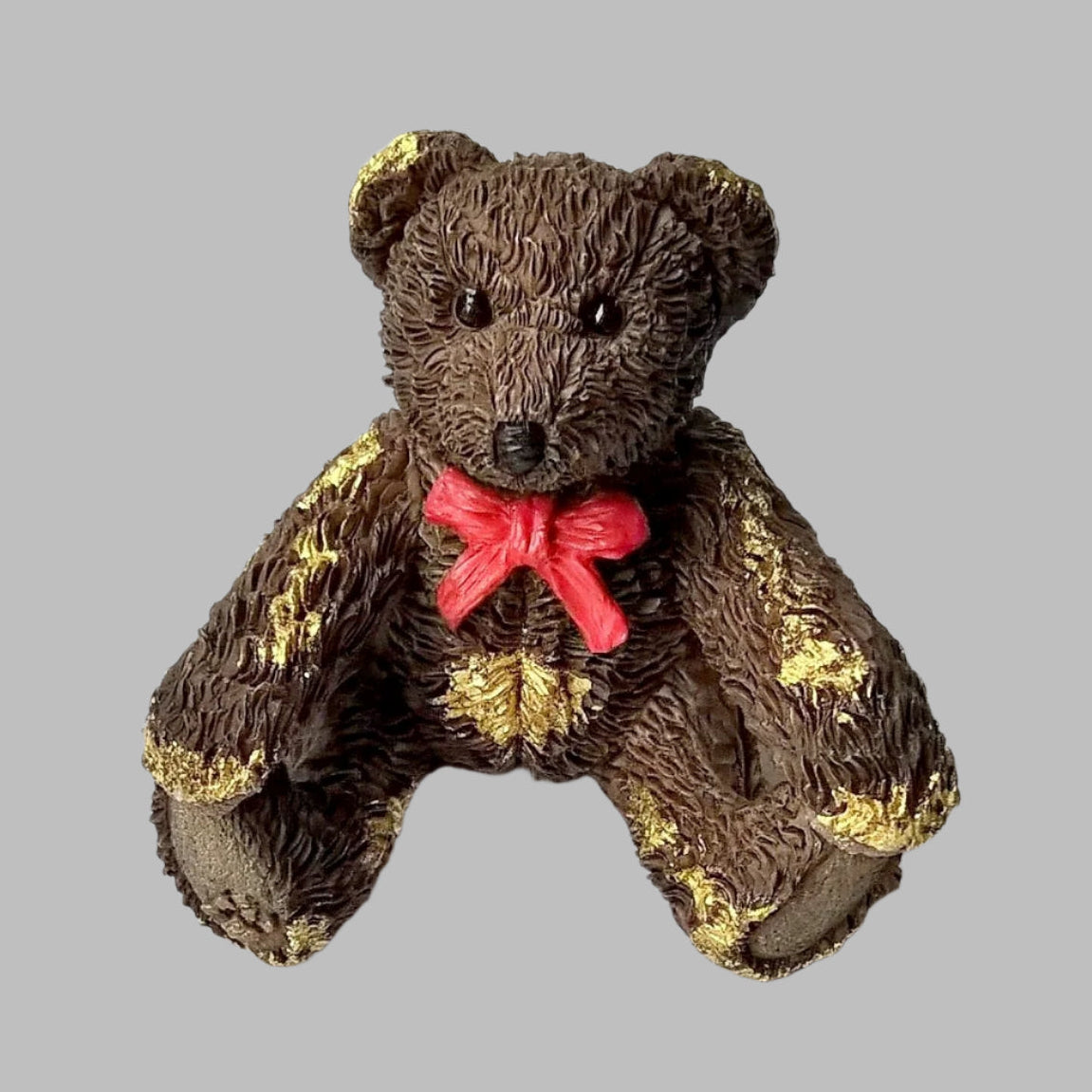 Vintage miniature ceramic brown bear from 1995 with bright red bow and hand gilded with pure 24ct gold to make it a unique one-off.  