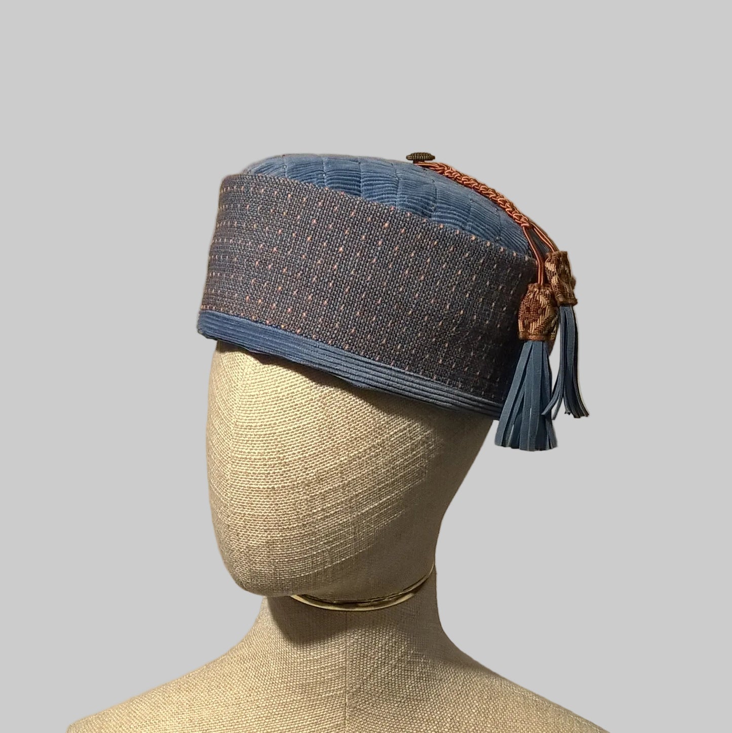 Blue Ethnic patterned pillbox hat with macrame tassels and leather fringing