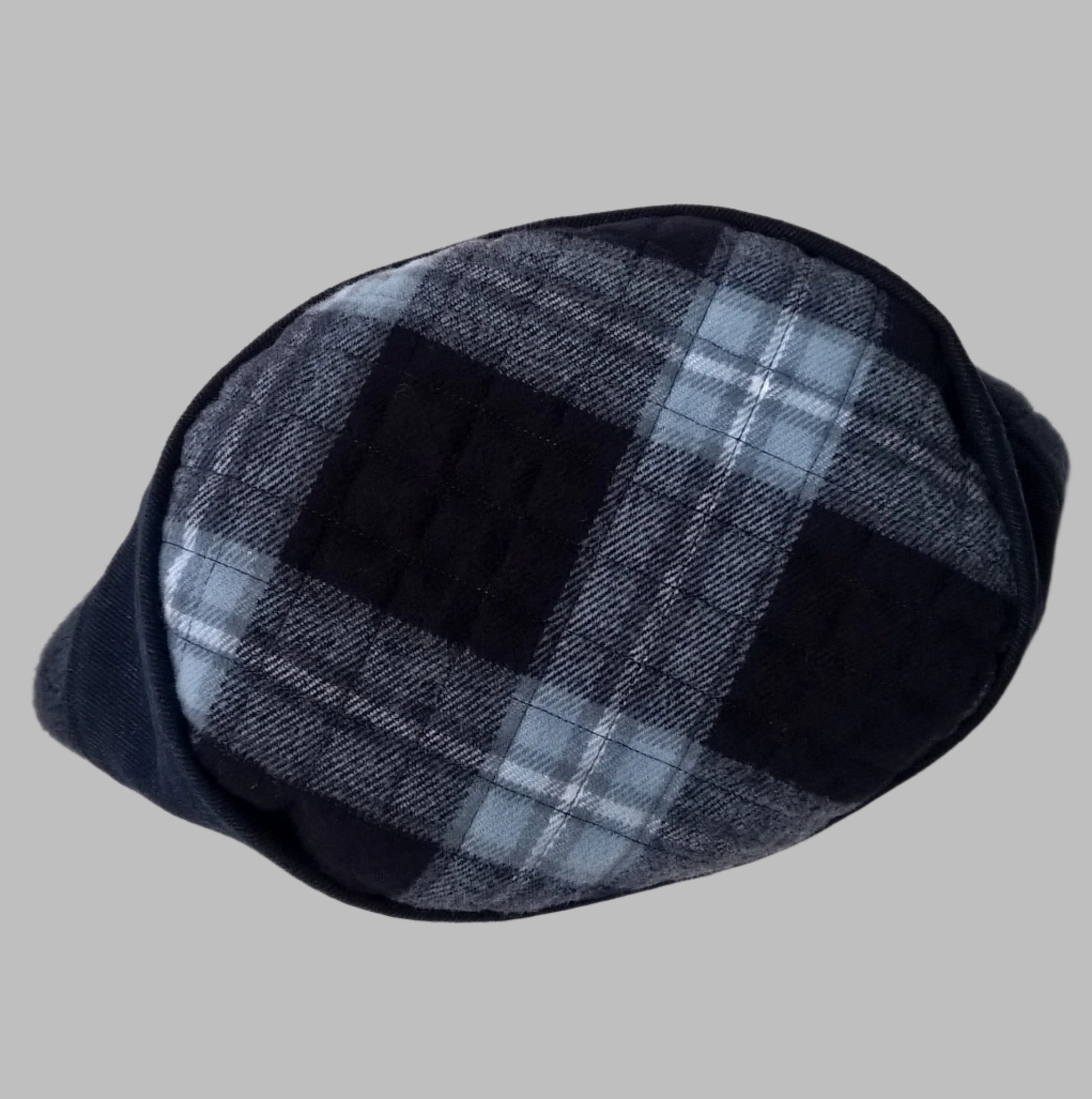 Blue lumberjack check patterned tip of brimless fleece and denim hat