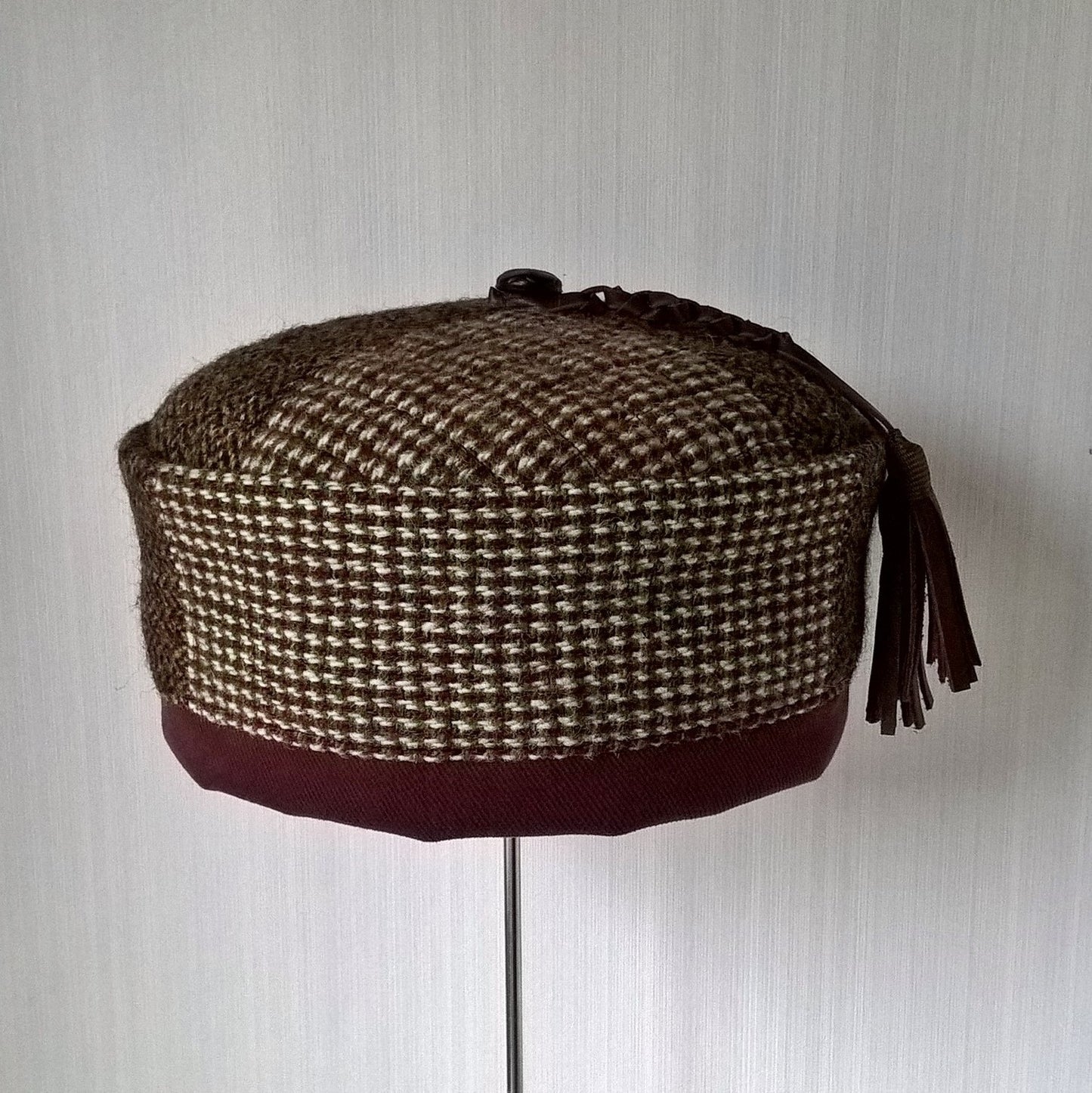 Front view of patchwork Harris Tweed smoking cap handmade from up-cycled  vintage jackets