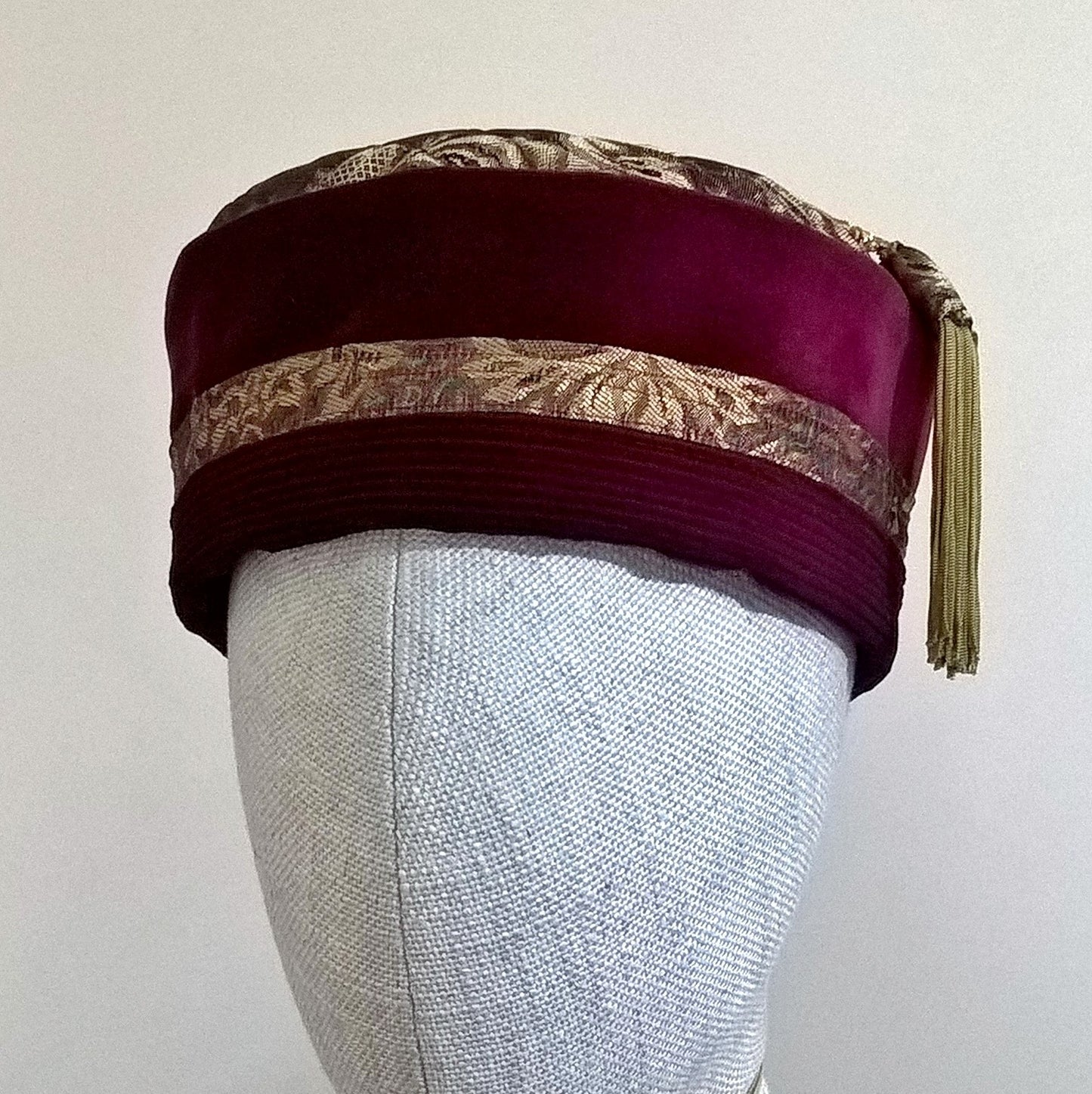 Gold brocade and red velvet pillbox shaped smoking cap with macrame tassel