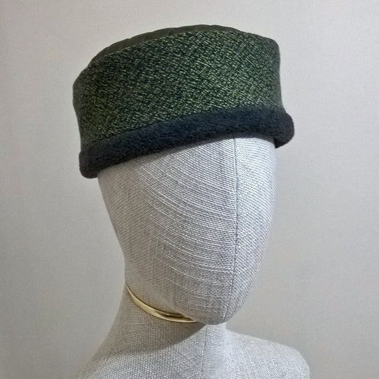 Mottled green wool brimless hat with grey marl fleece lining