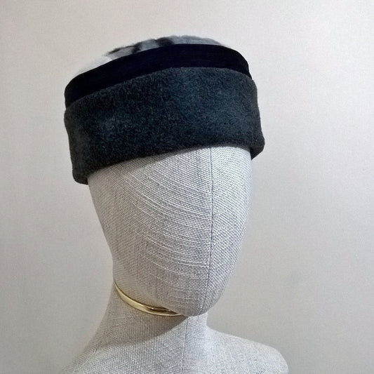 Grey marl fleece and navy corduroy brimless hat with ethnic patterned tip