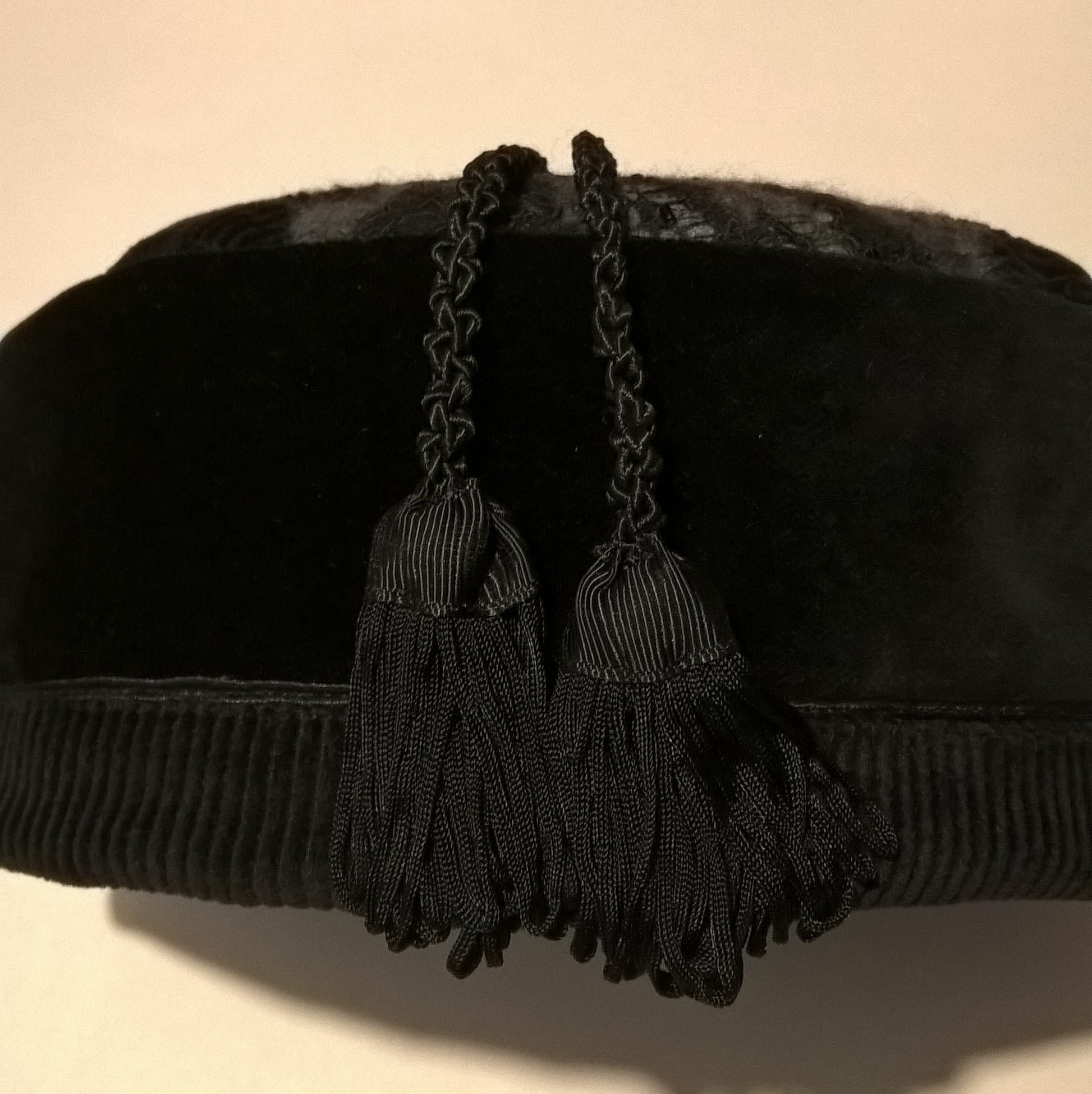 Handmade two strand macrame tassel on black velvet smoking cap