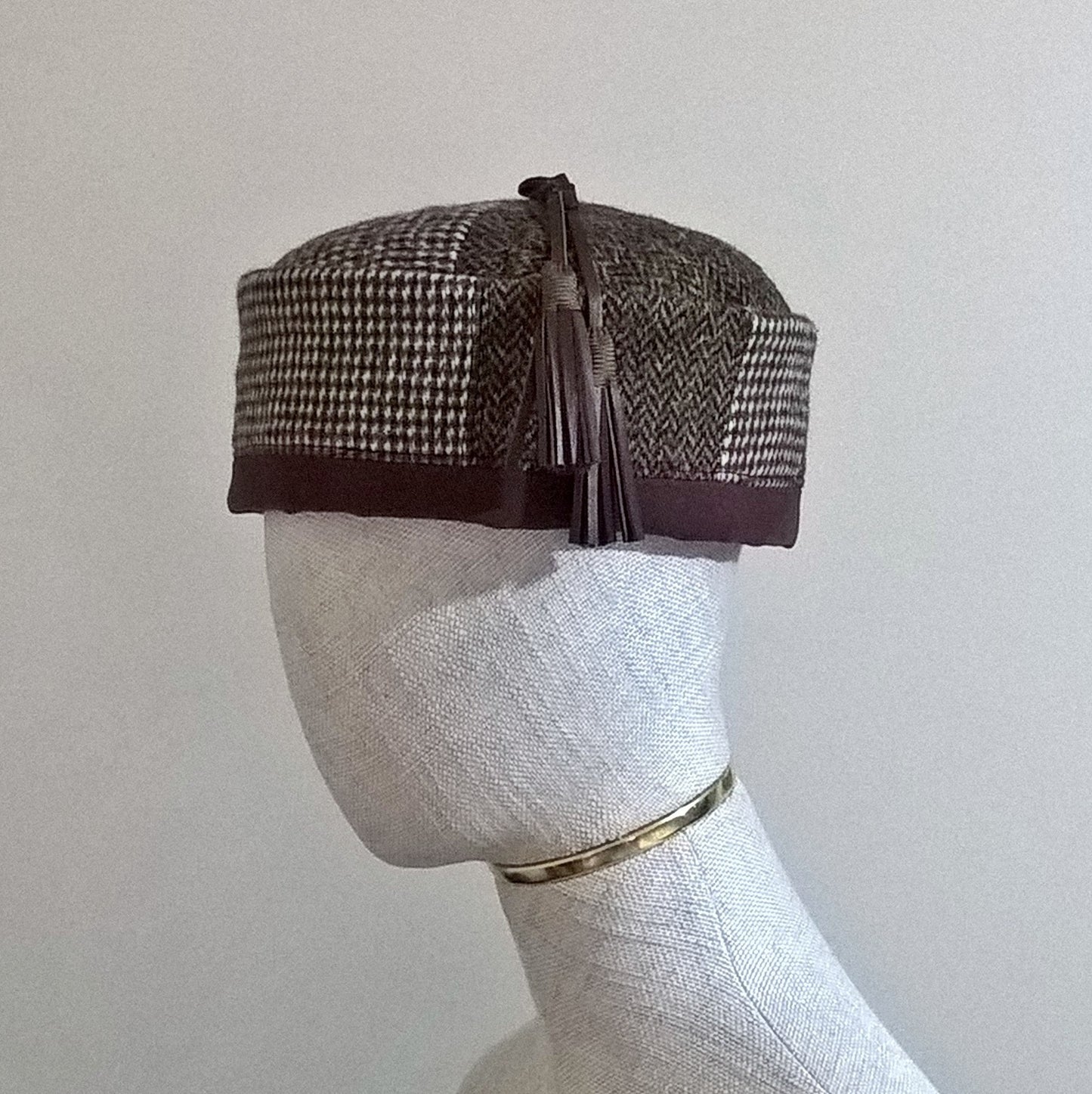 Harris tweed pillbox hat with leather tassel