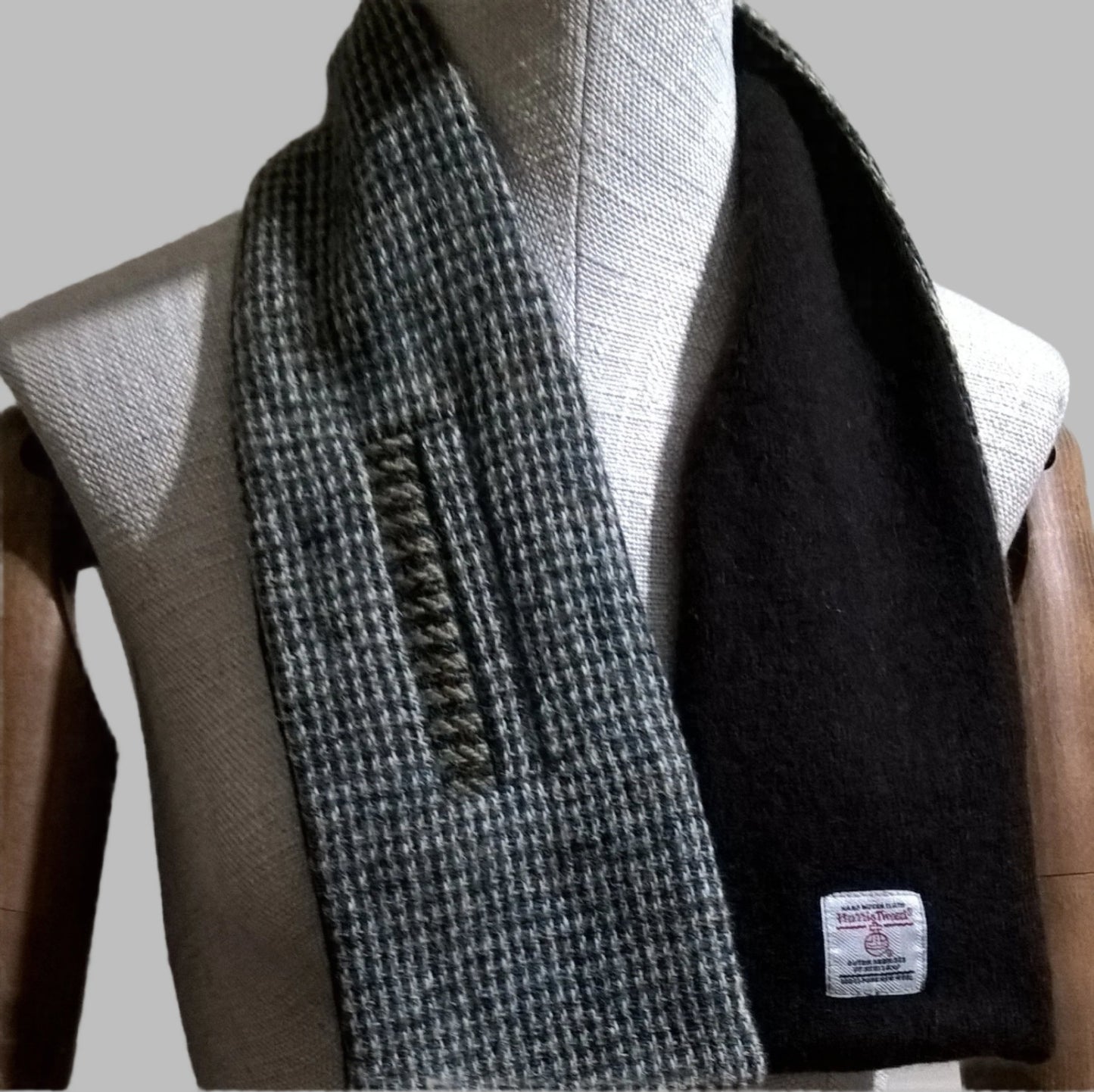 The chocolate brown pure cashmere  compliments the browns in the dogtooth check of the Harris Tweed