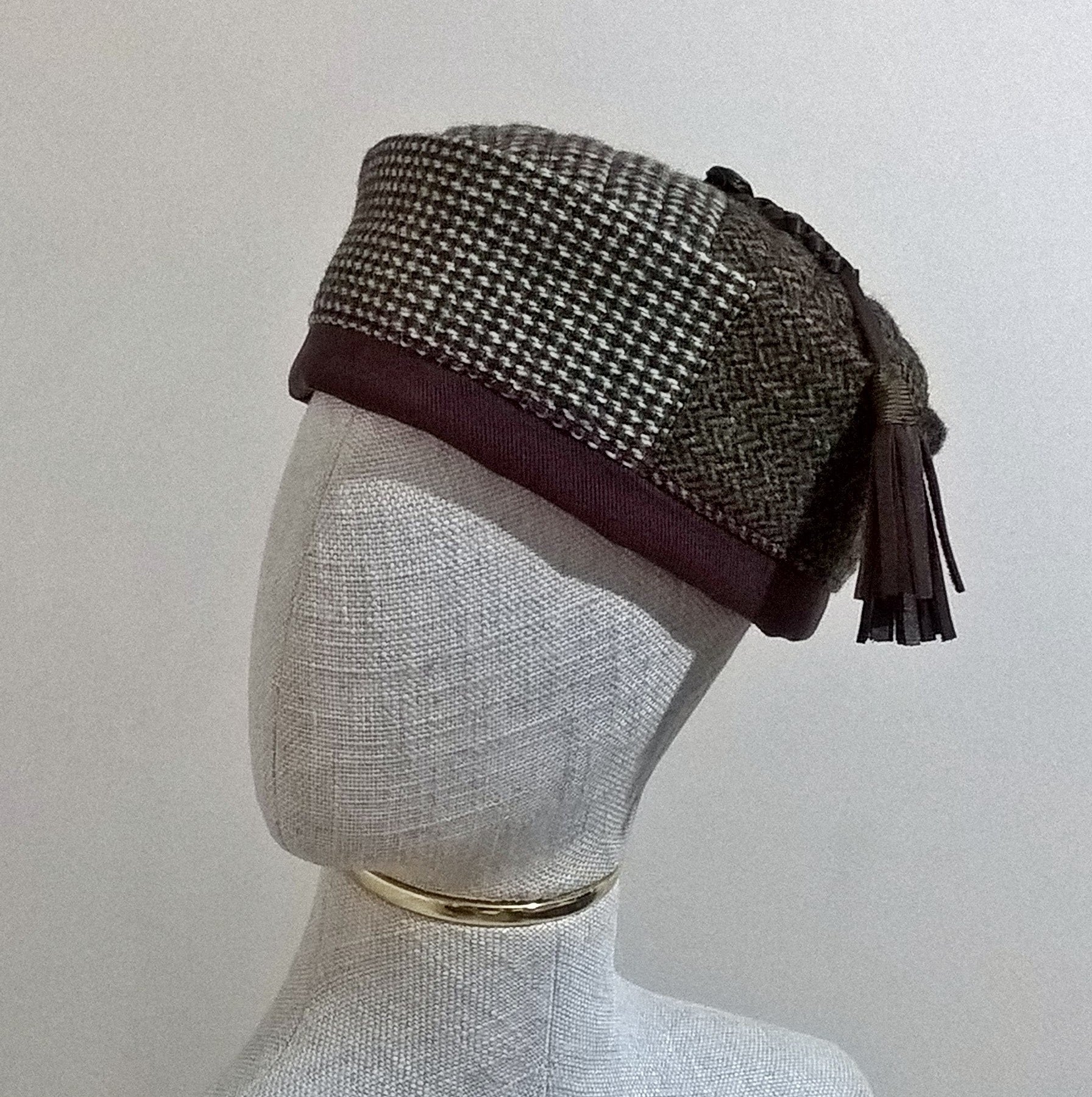 Mismatched Harris Tweed wool smoking cap  in patchwork design with leather tassel