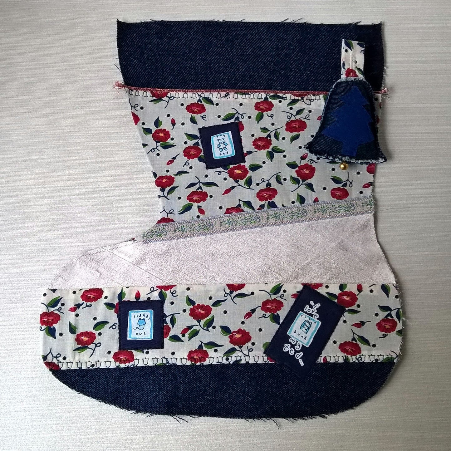 Christmas stocking with patch work applique and teddy motifs