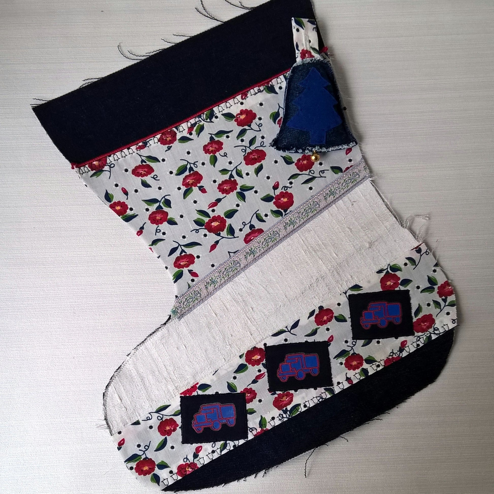 Indigo and poinsettia stocking ready for personalising with name embroidery
