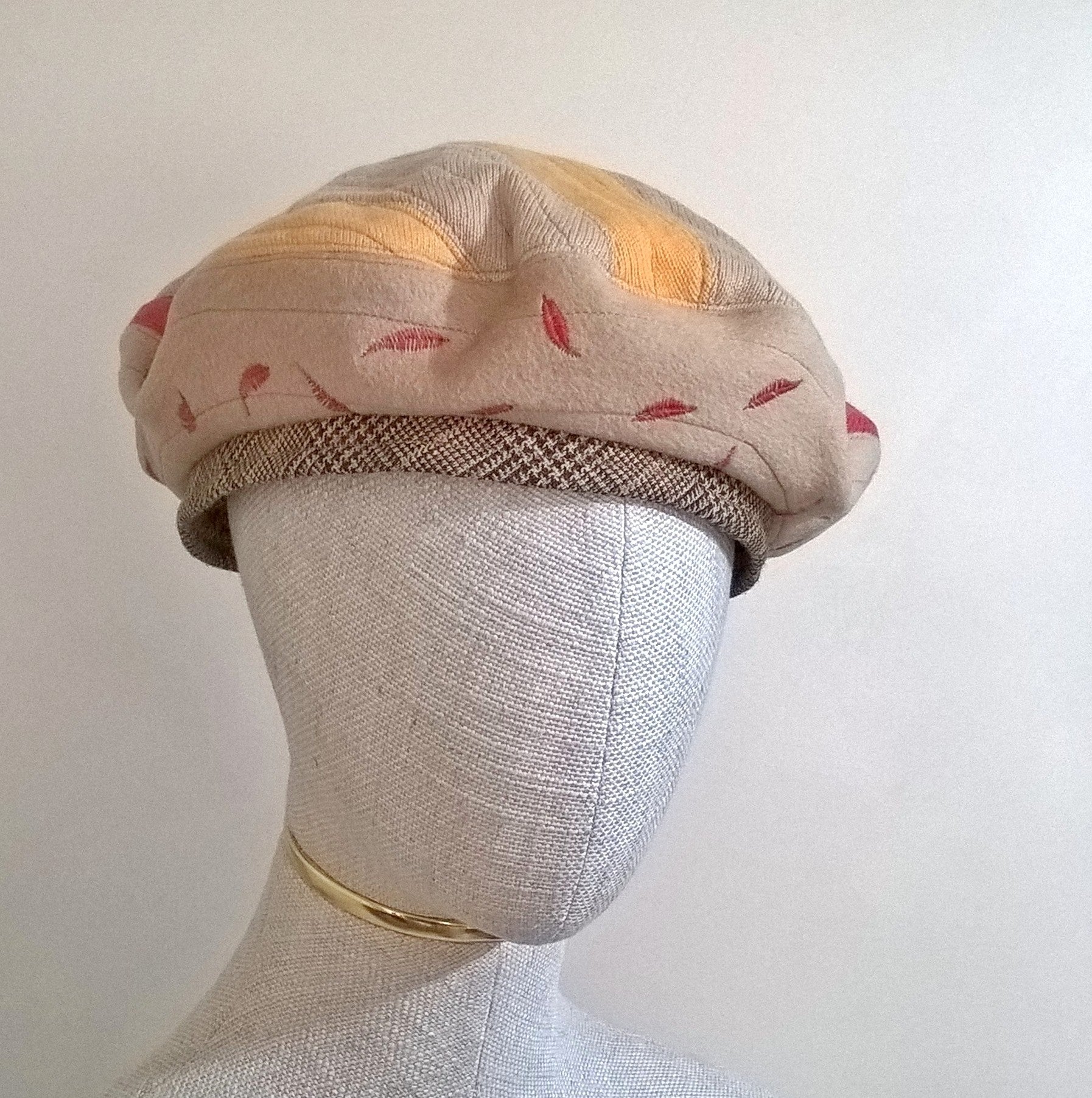 Quilted patchwork beret handmade in fawn, red and yellow cashmere with wool check trim and leaf embroidery