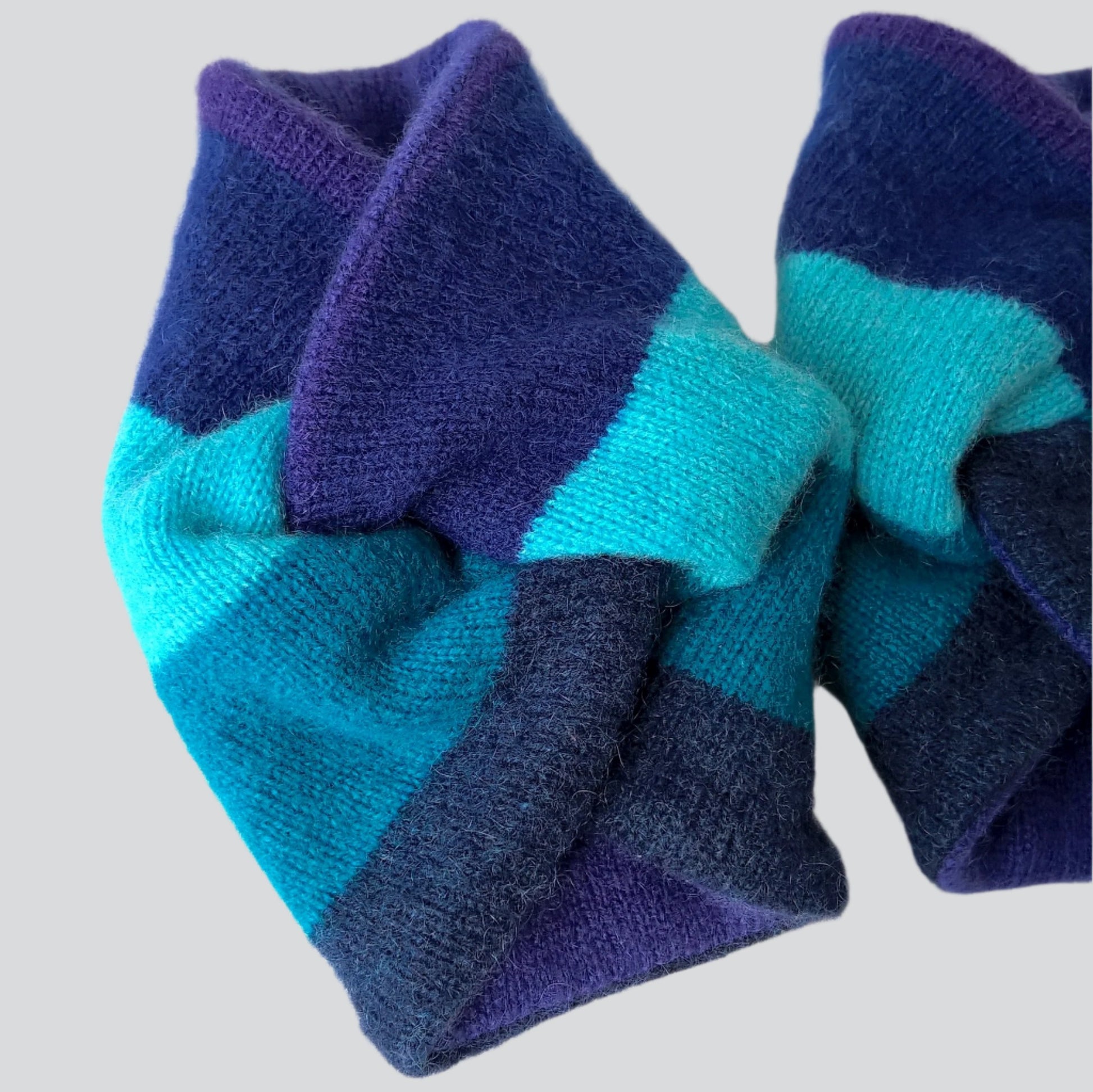 Green and navy stripe cashmere wrist cuffs lined with purple cashmere