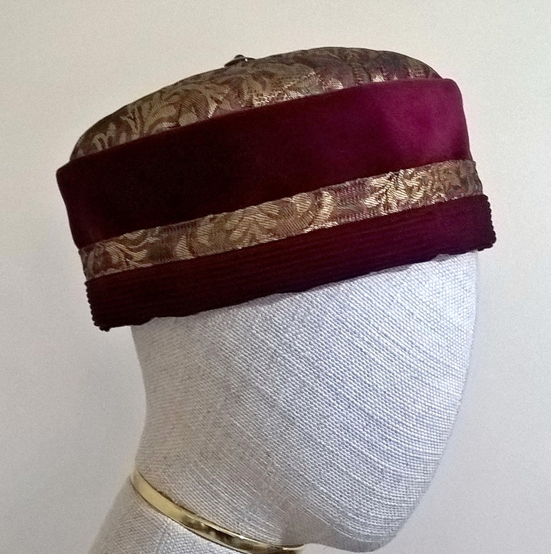 Red velvet brimless cap with gold brocade