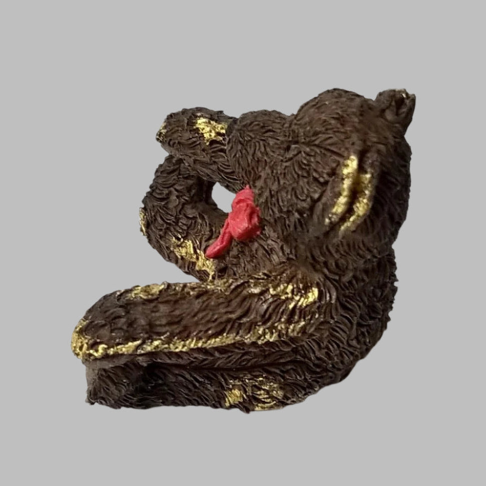 Vintage miniature ceramic brown bear from 1995 with bright red bow and hand gilded with pure 24ct gold to make it a unique one-off.  