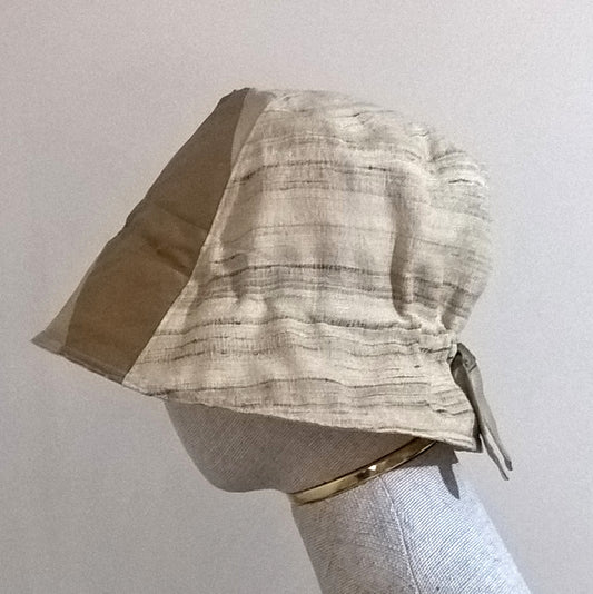 Bell shaped bucket hat handmade with raw and satin silk, lined with cotton.