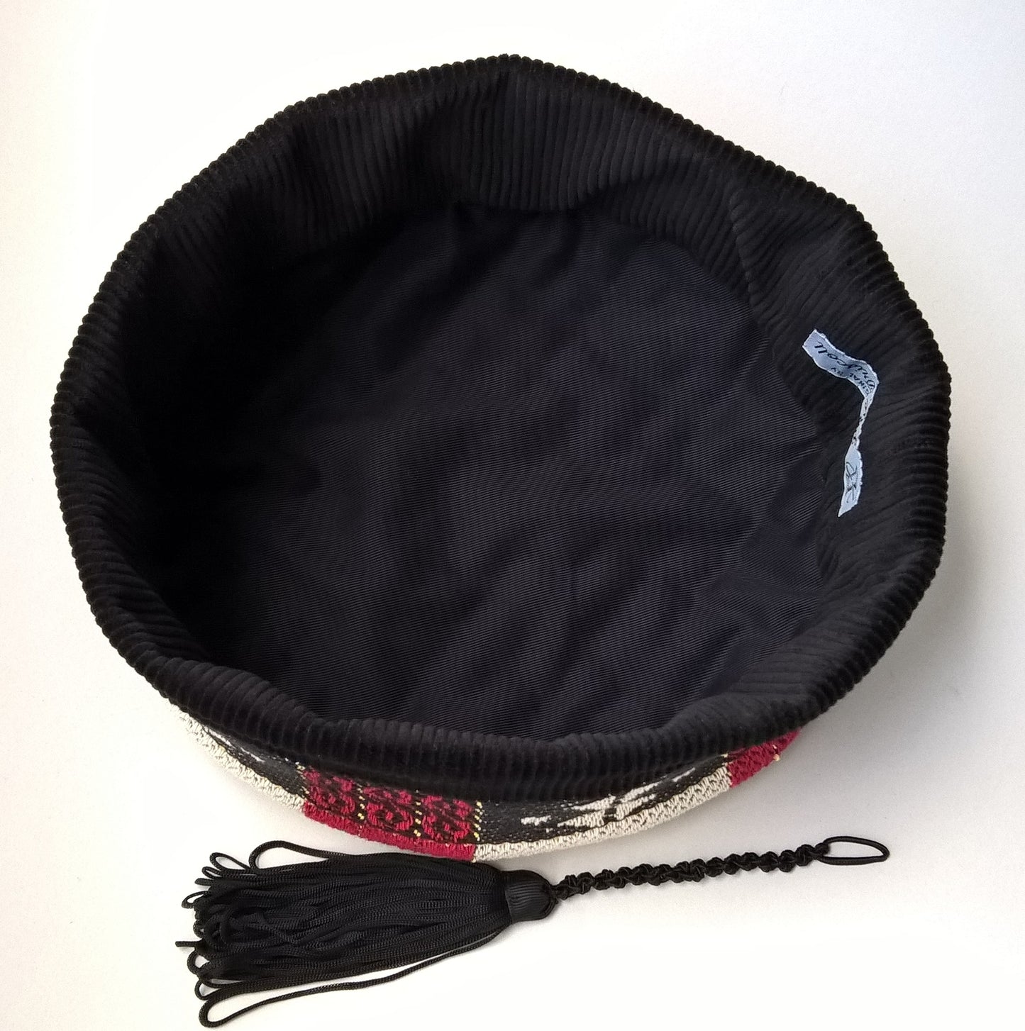 The cap has removable tassel and cotton lining